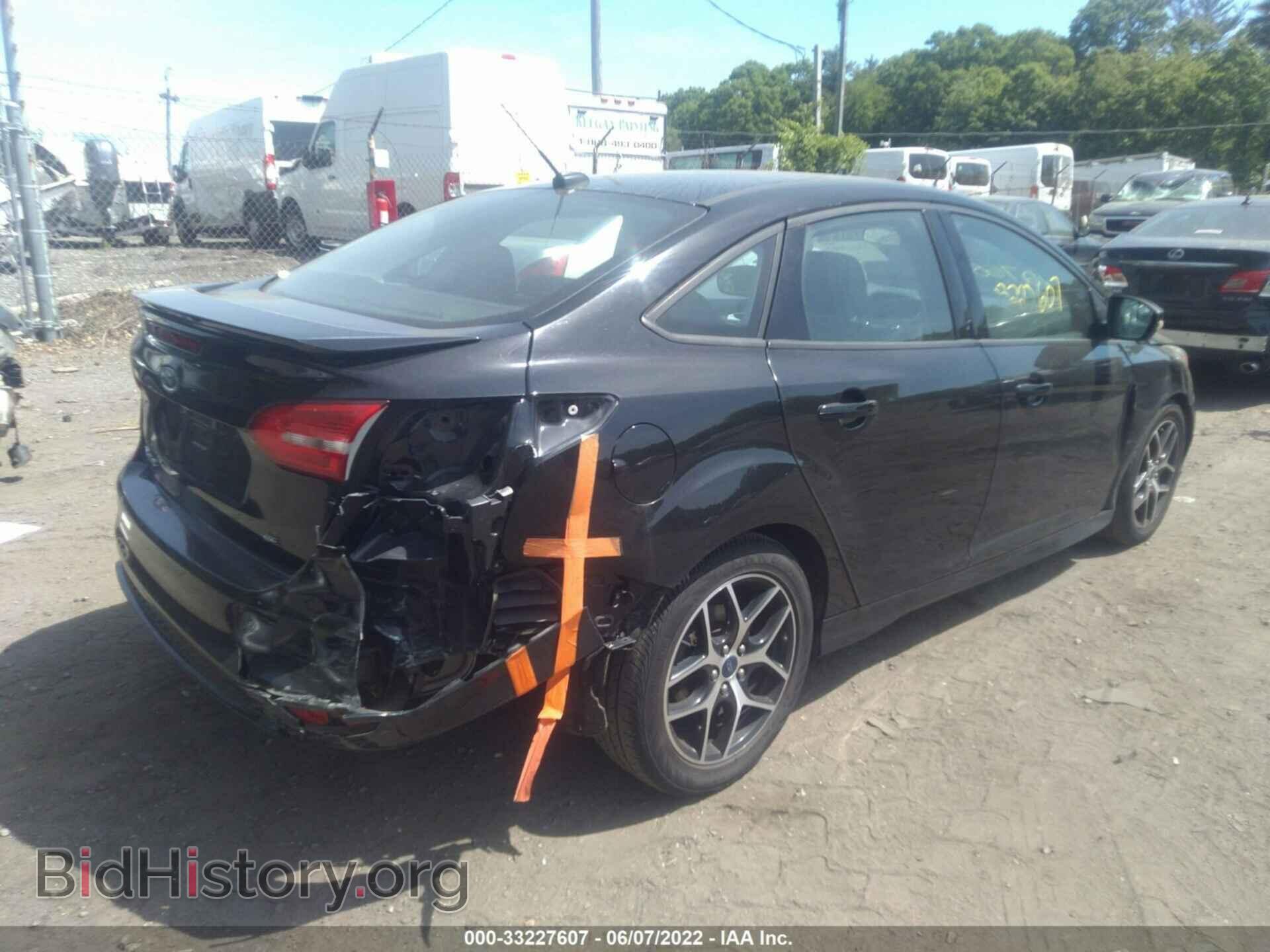 2016 FORD FOCUS - VIN: 1FADP3F27GL296303 - Photo 4