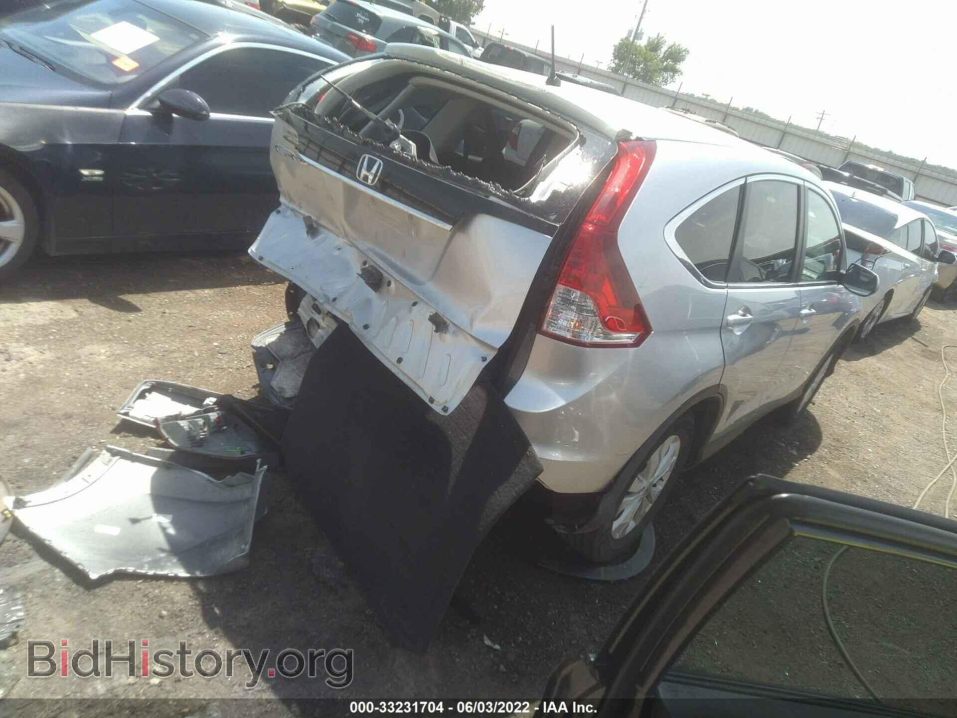 2012 HONDA CR-V - VIN: 2HKRM3H52CH509396 - Фото 4