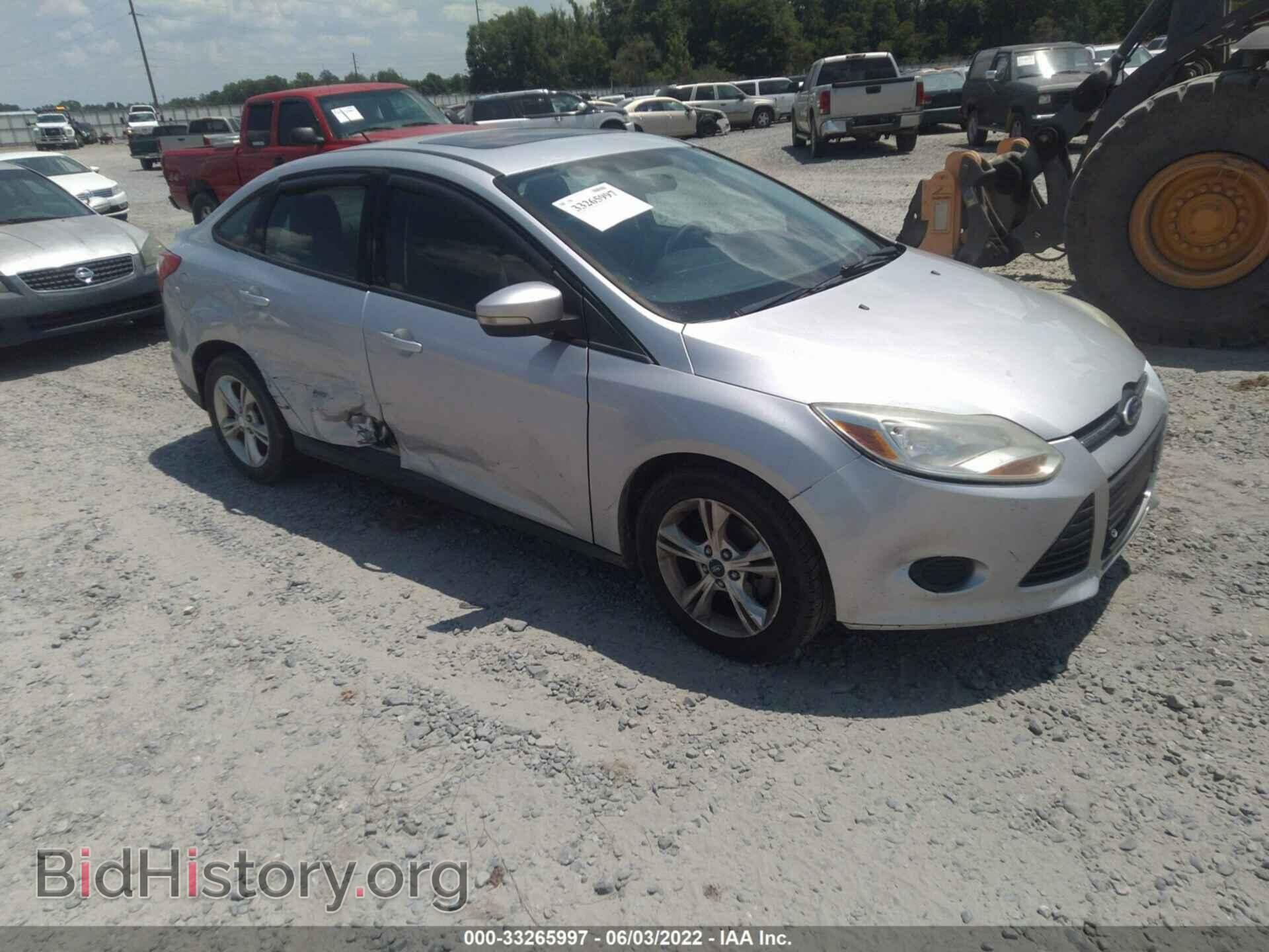Фотография 1FADP3F28DL201534 - FORD FOCUS 2013