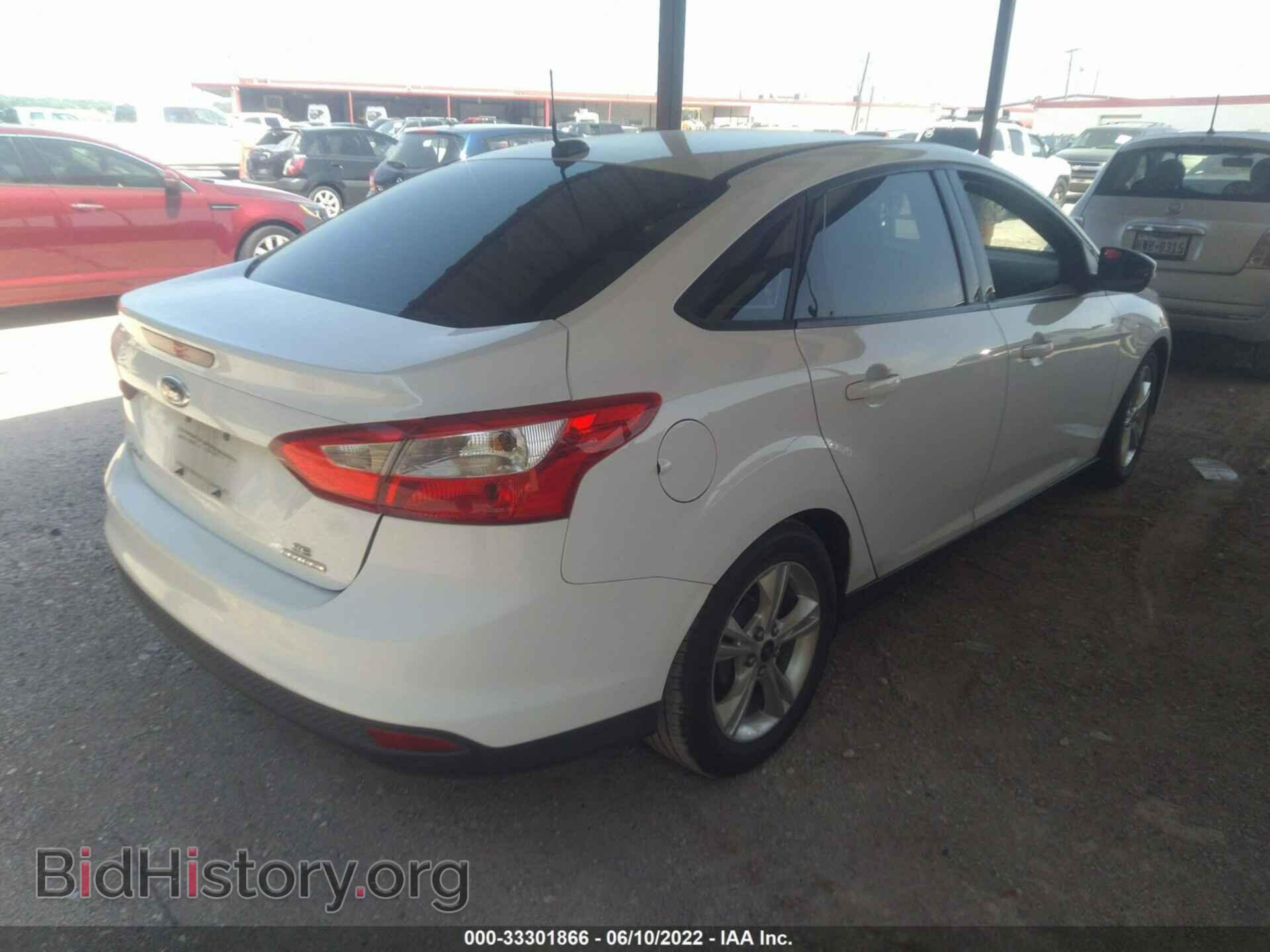 2014 FORD FOCUS - VIN: 1FADP3F2XEL211628 - Photo 4