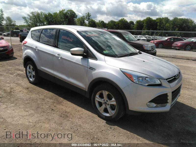 2014 Ford ESCAPE SE (VIN 1FMCU9GX4EUE01104) — фото 1 из 11, IAAI, повреждение: правый бок