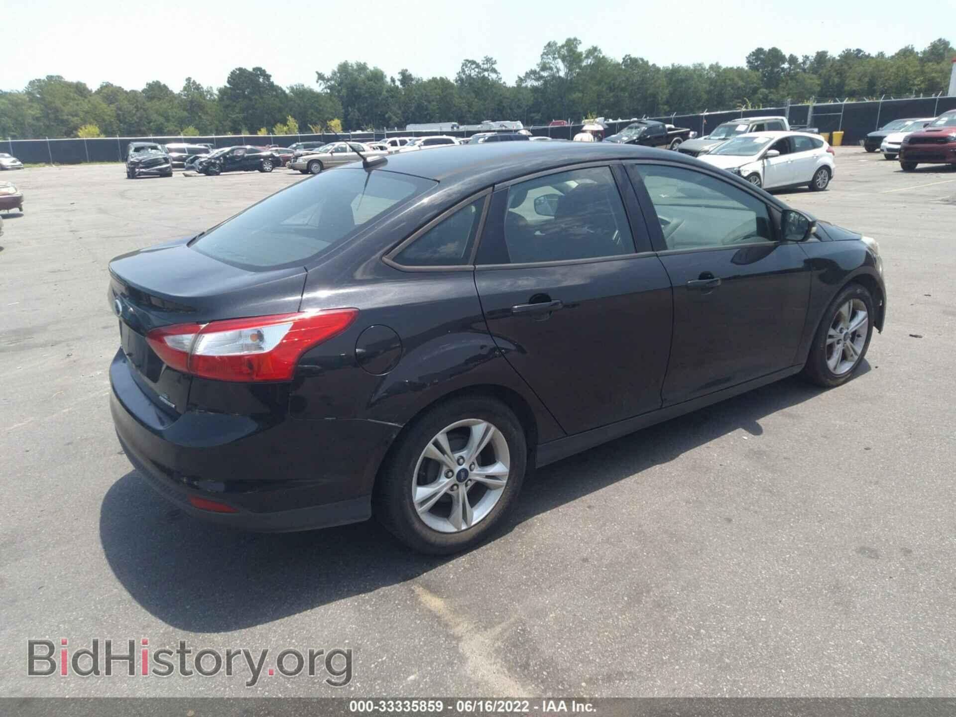 2014 FORD FOCUS - VIN: 1FADP3F22EL452521 - Photo 4