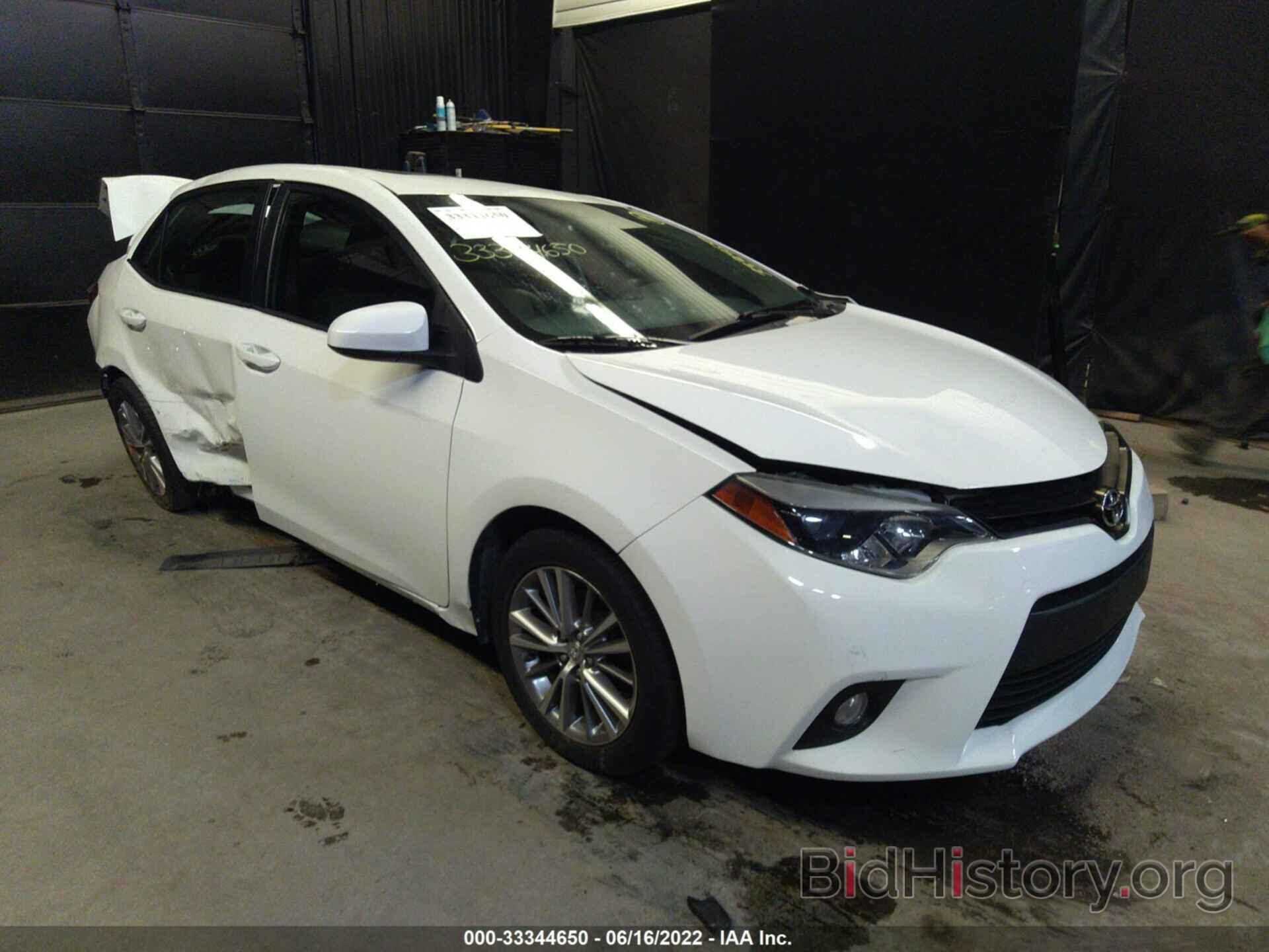 Photo 5YFBURHE9EP021346 - TOYOTA COROLLA 2014