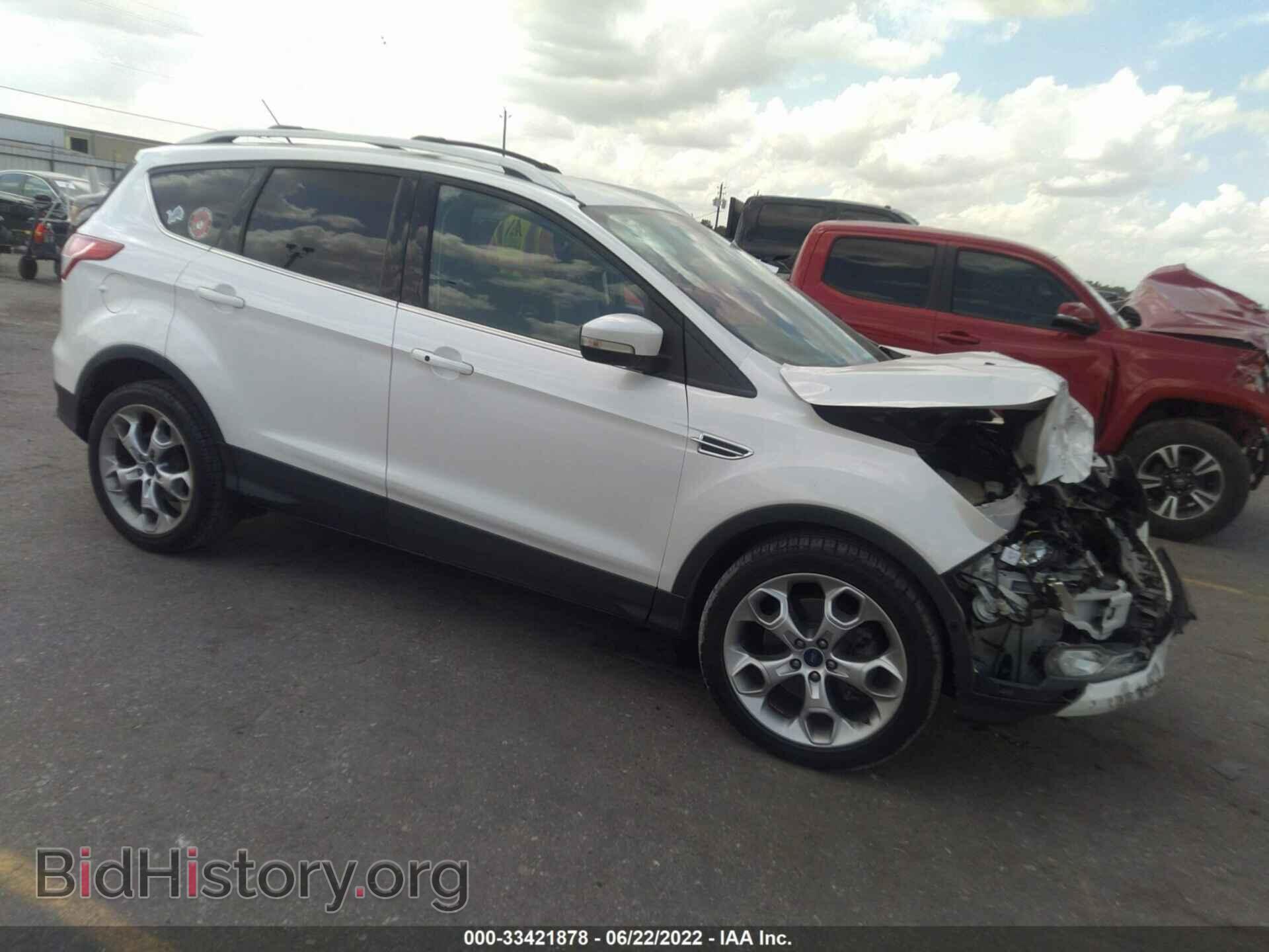 Фотография 1FMCU0J90EUE25339 - FORD ESCAPE 2014