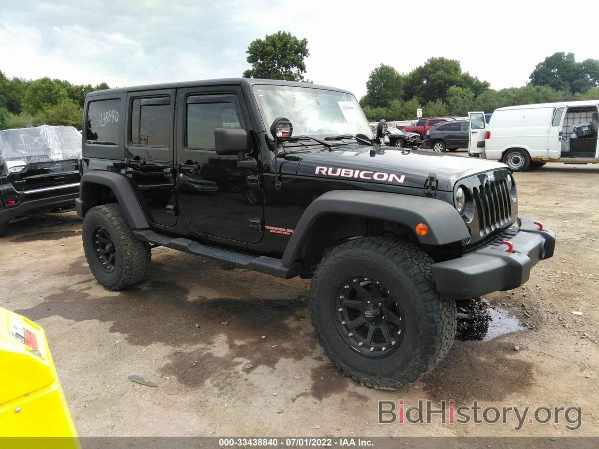 Photo 1J4BA6H14BL509722 - JEEP WRANGLER UNLIMITED 2011