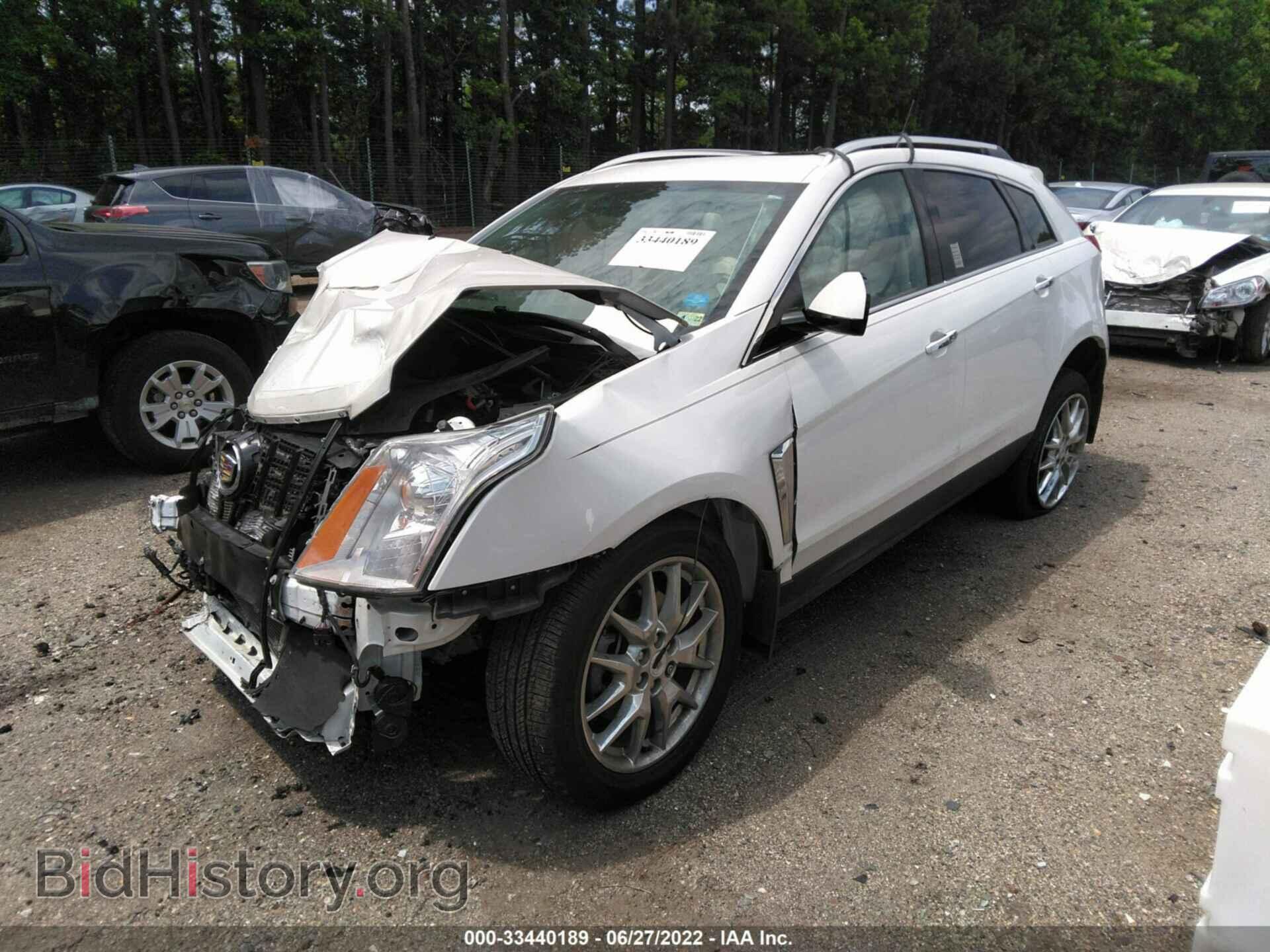 2014 CADILLAC SRX - VIN: 3GYFNCE31ES596097 - Фото 2