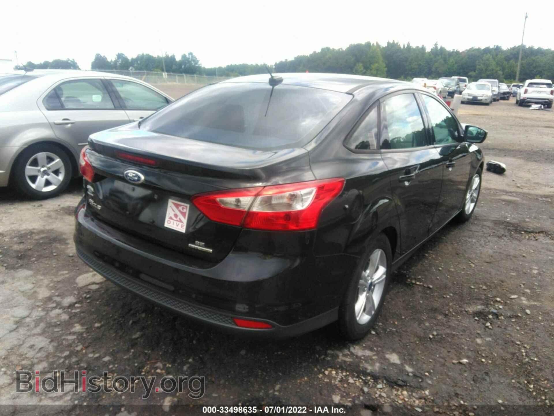 2014 FORD FOCUS - VIN: 1FADP3F28EL386864 - Photo 4