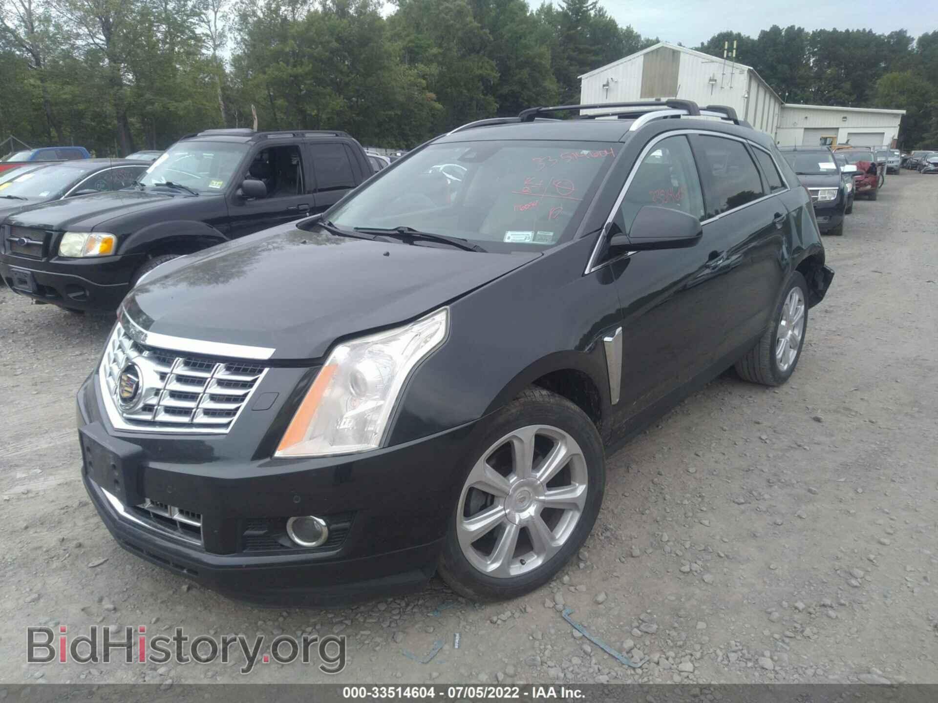 2014 CADILLAC SRX - VIN: 3GYFNFE32ES677465 - Фото 2
