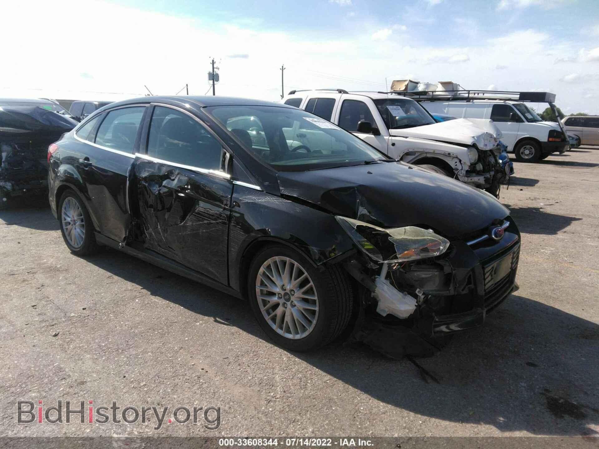 Фотография 1FADP3J29EL390459 - FORD FOCUS 2014