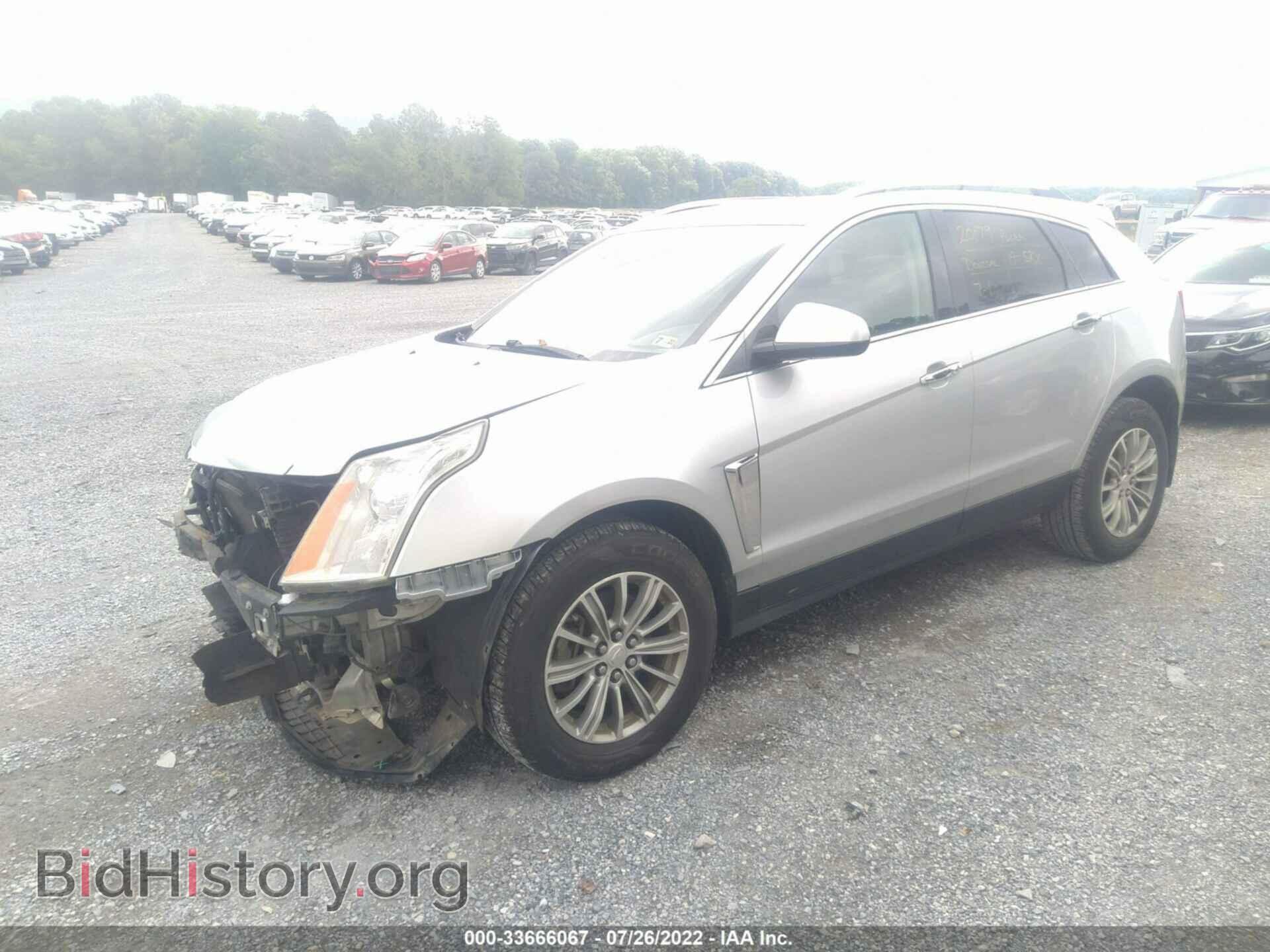 2014 CADILLAC SRX - VIN: 3GYFNCE36ES517085 - Фото 2