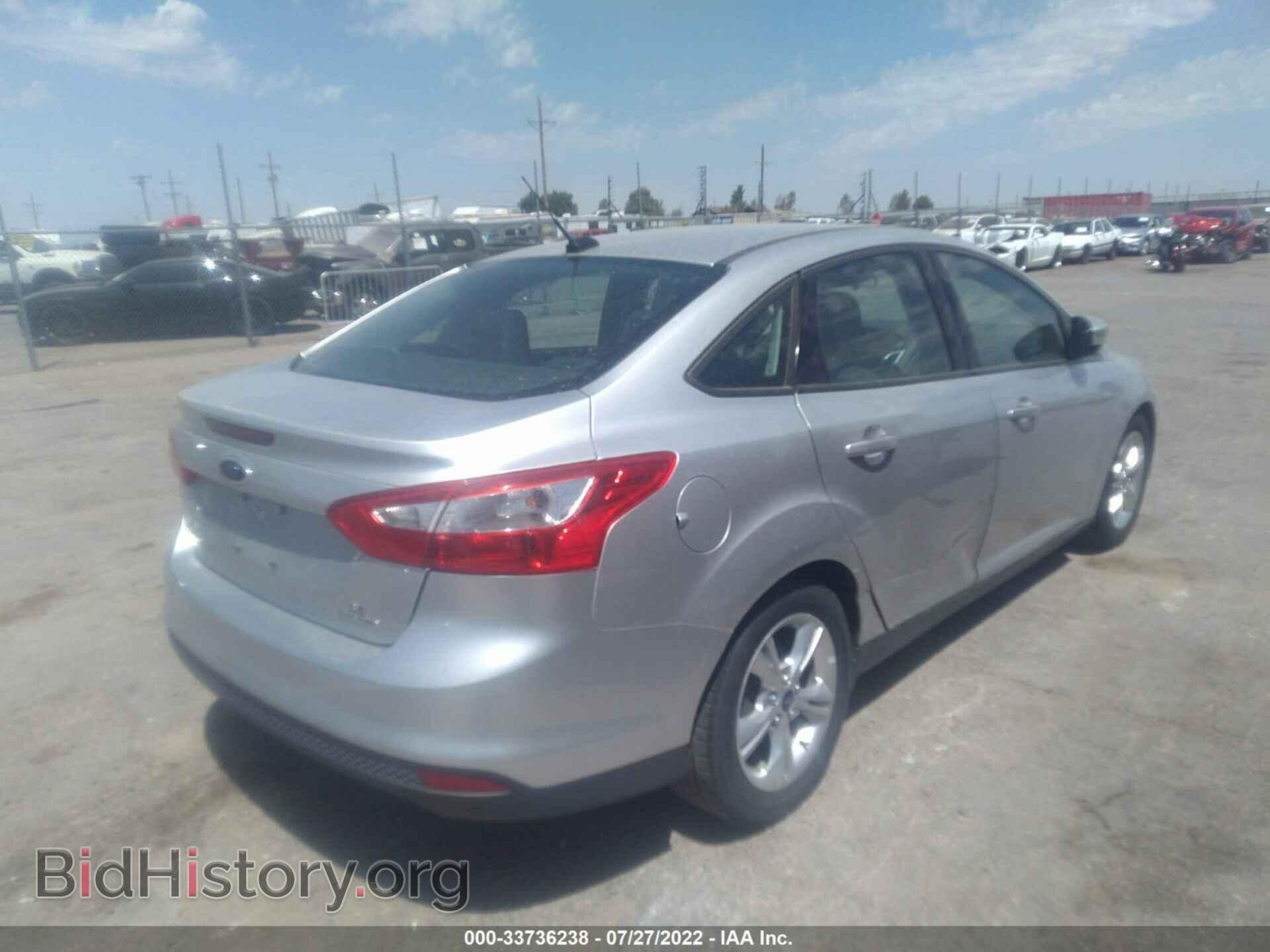 2014 FORD FOCUS - VIN: 1FADP3F21EL284001 - Photo 4