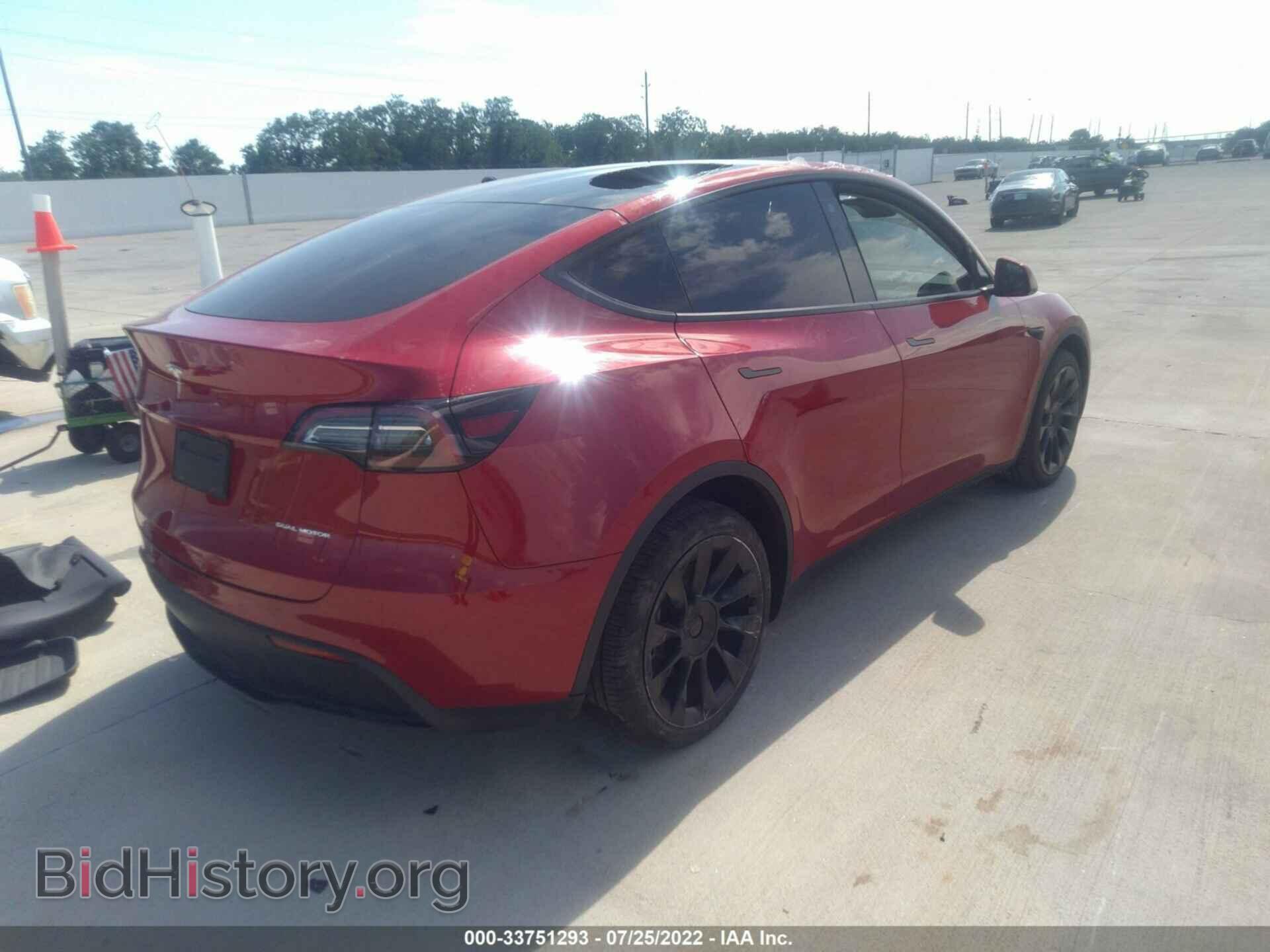 2022 TESLA MODEL Y - VIN: 7SAYGDEE0NF318979 - Photo 4