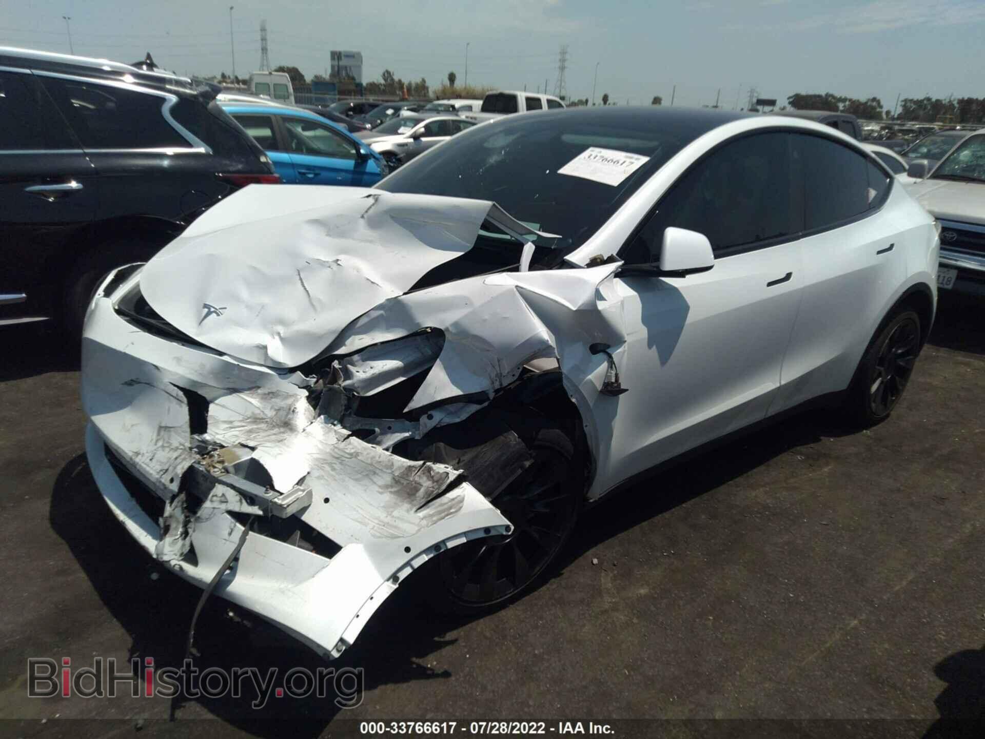 2022 TESLA MODEL Y - VIN: 7SAYGAEE9NF349601 - Фото 2