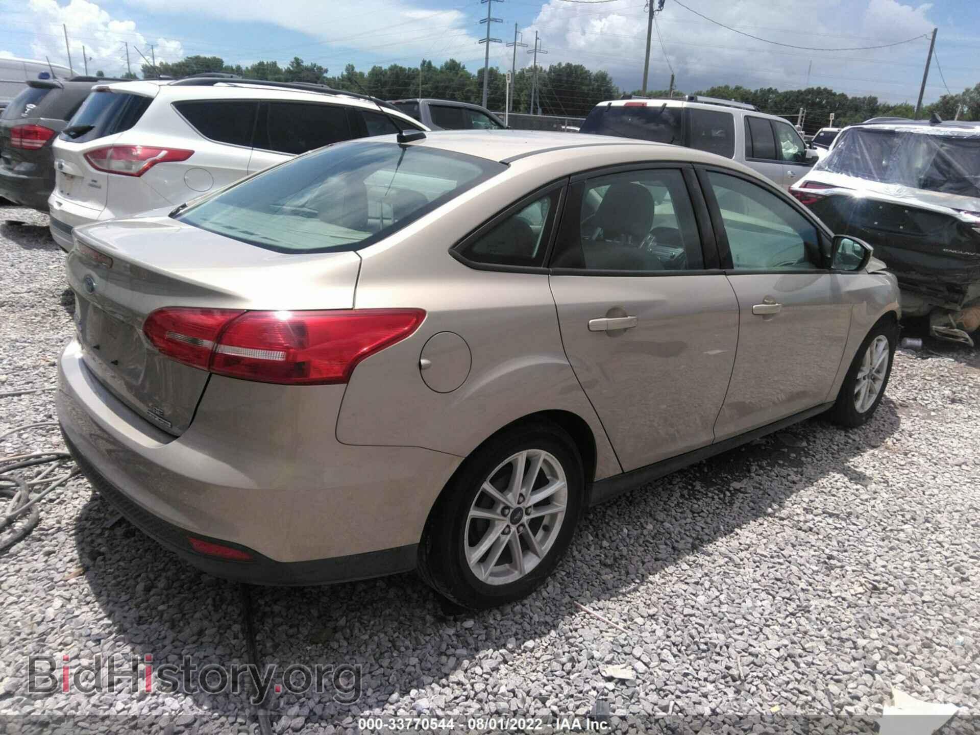 2015 FORD FOCUS - VIN: 1FADP3F22FL209082 - Photo 4