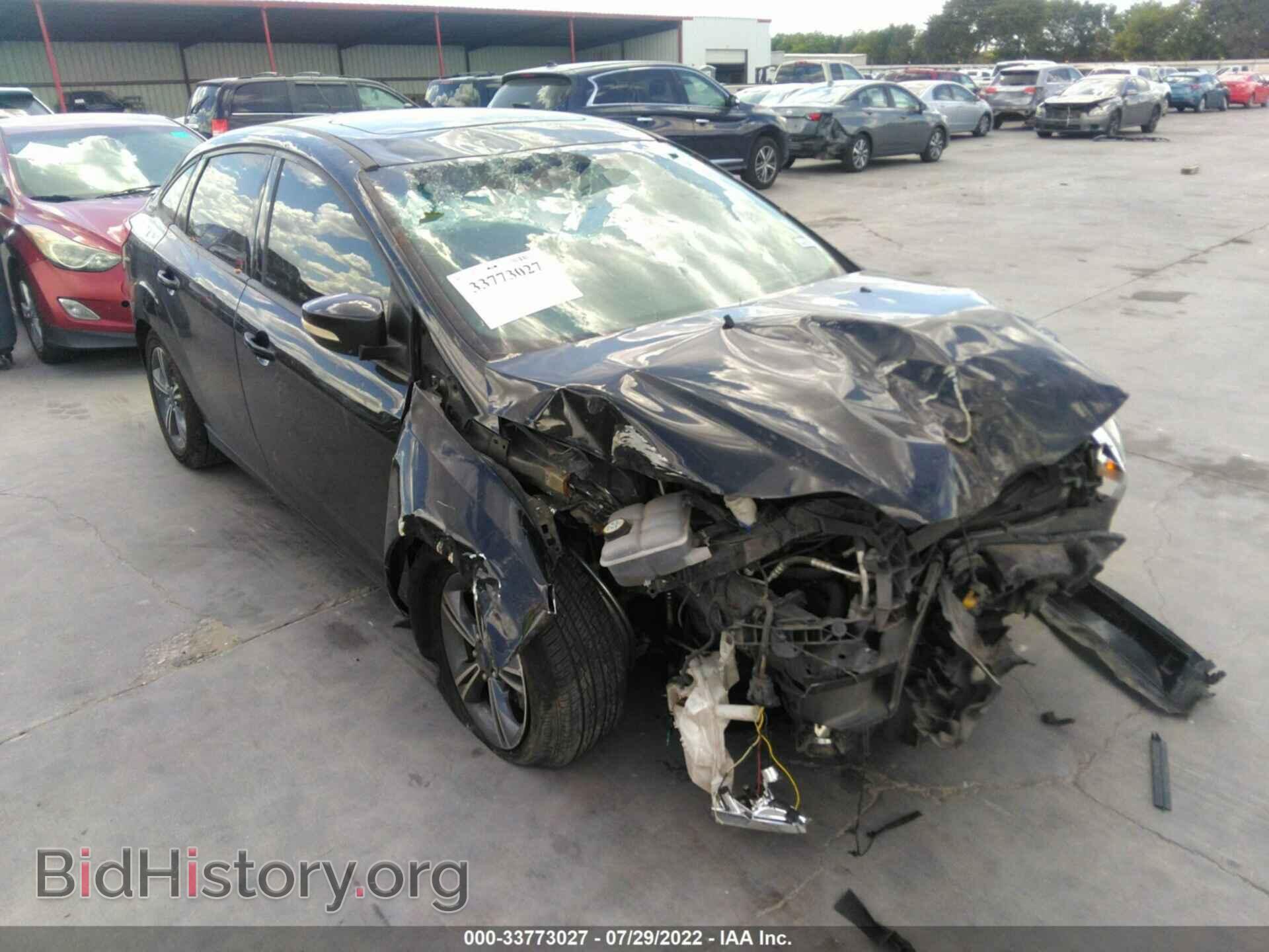 Фотография 1FADP3F27EL372423 - FORD FOCUS 2014