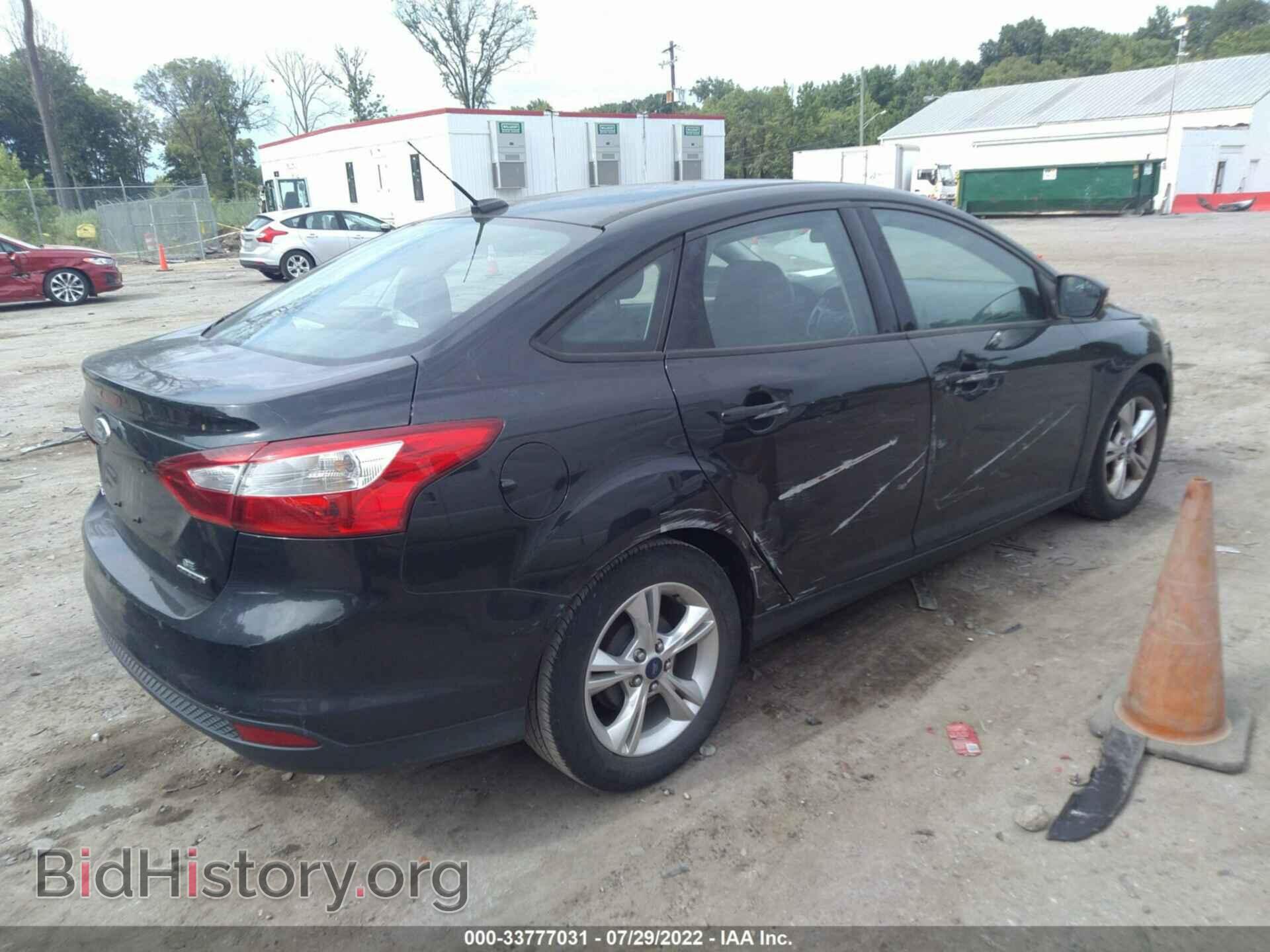 2014 FORD FOCUS - VIN: 1FADP3F2XEL310028 - Photo 4