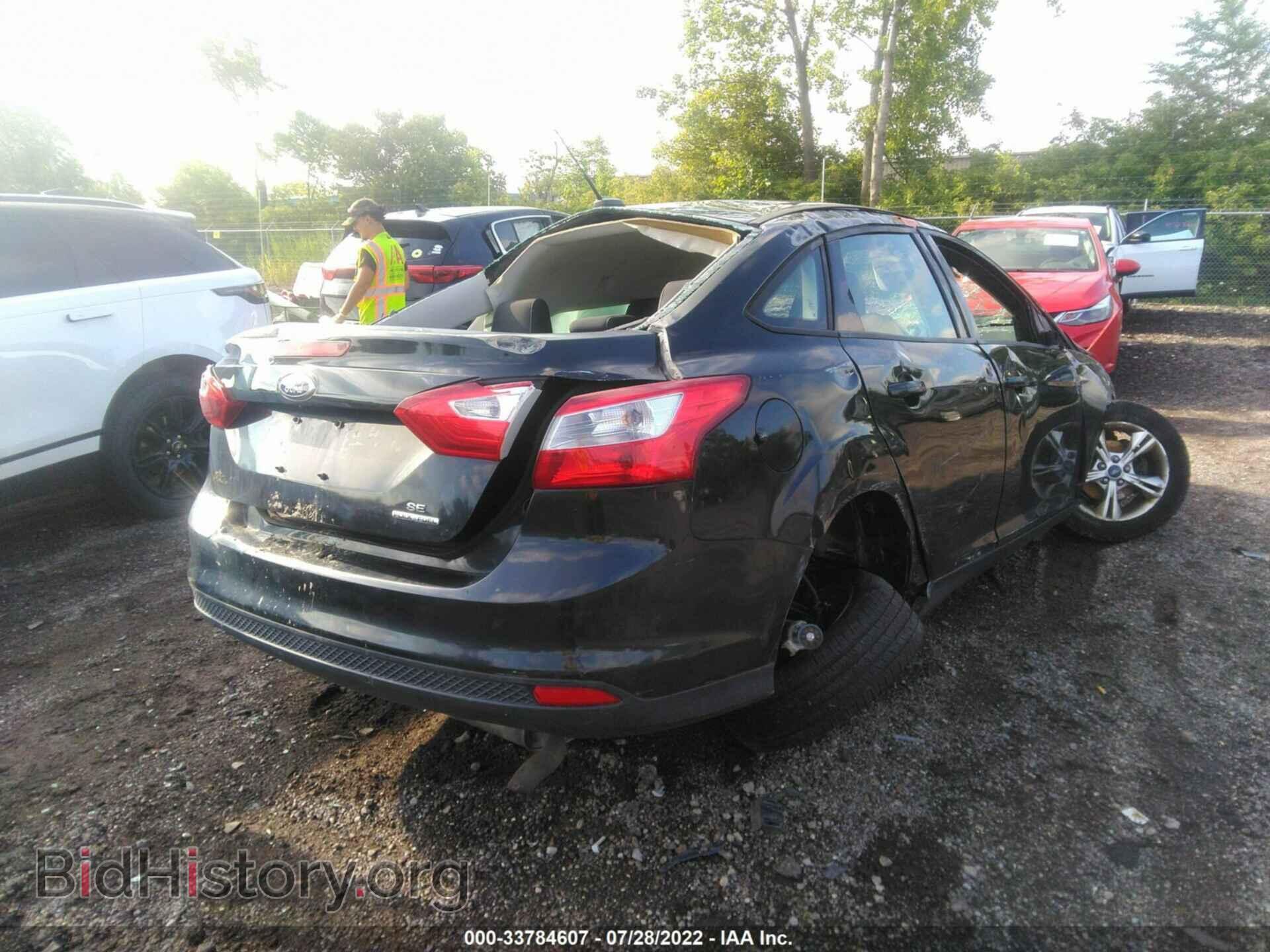 2014 FORD FOCUS - VIN: 1FADP3F22EL360955 - Photo 4