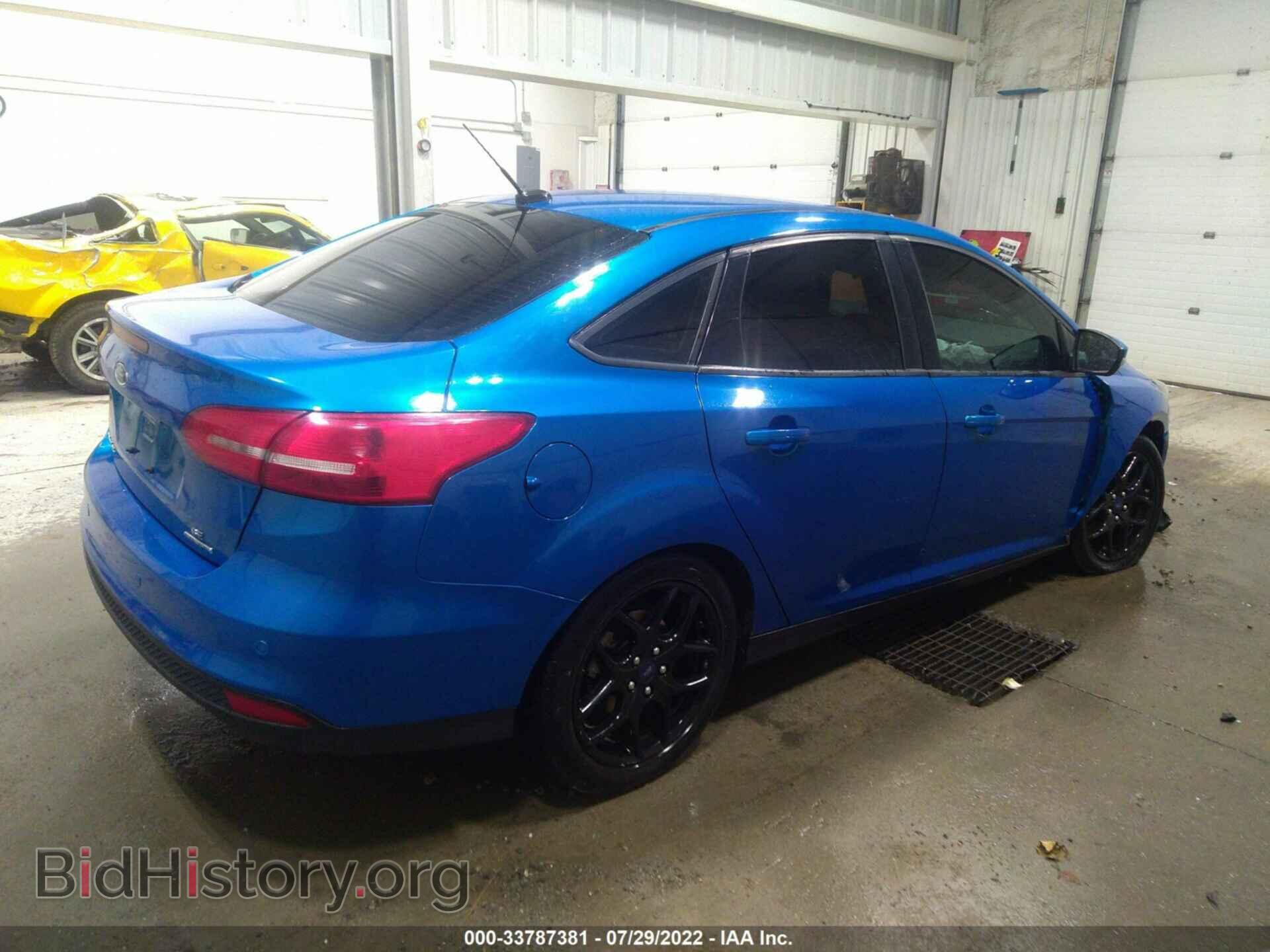 2016 FORD FOCUS - VIN: 1FADP3F27GL303024 - Photo 4