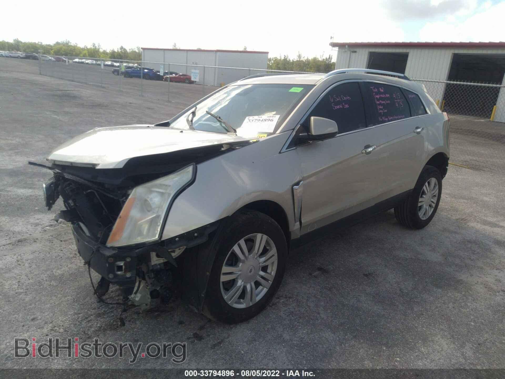 2013 CADILLAC SRX - VIN: 3GYFNCE38DS648758 - Фото 2