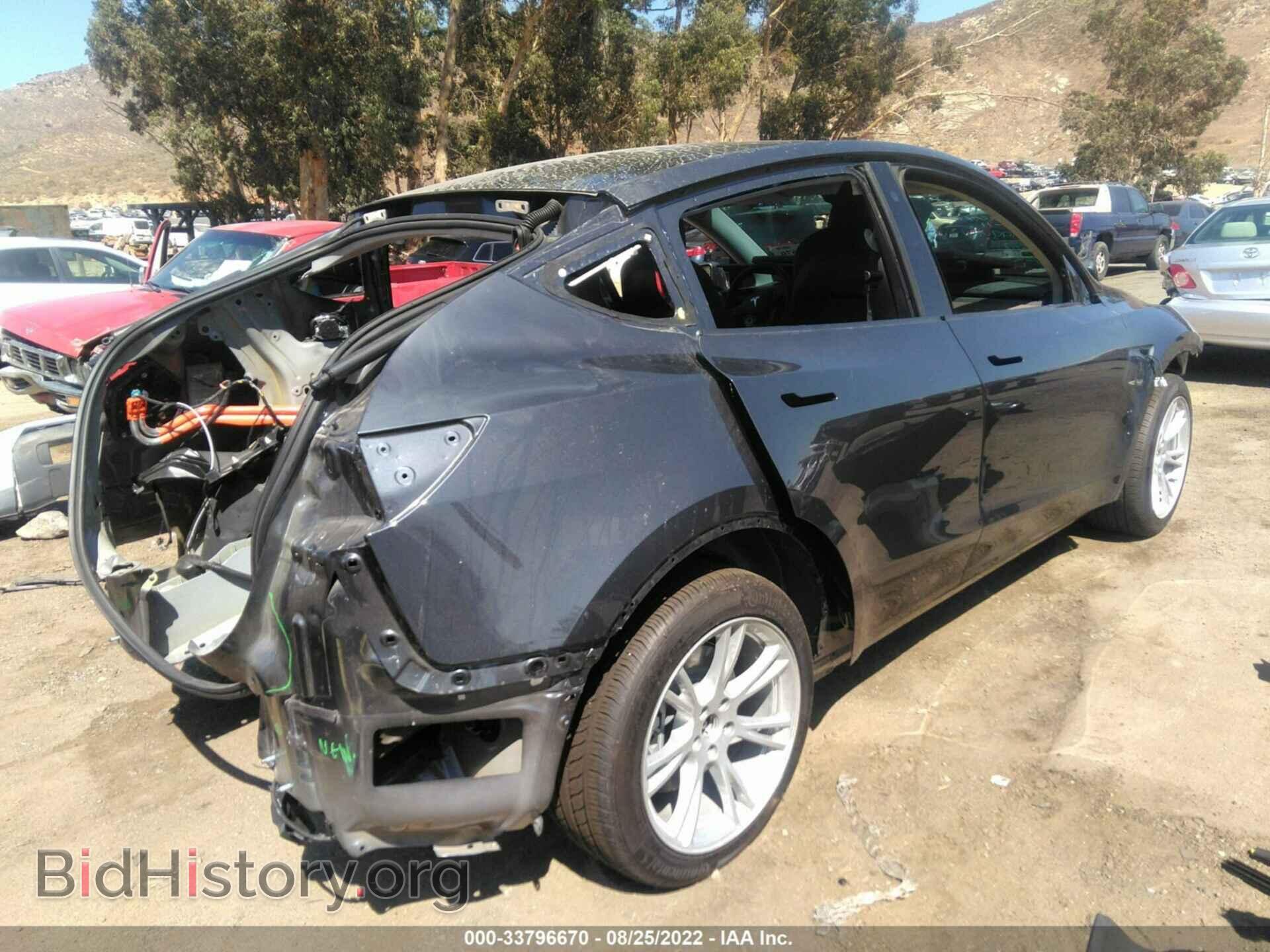 2022 TESLA MODEL Y - VIN: 7SAYGDEE3NF365908 - Фото 4