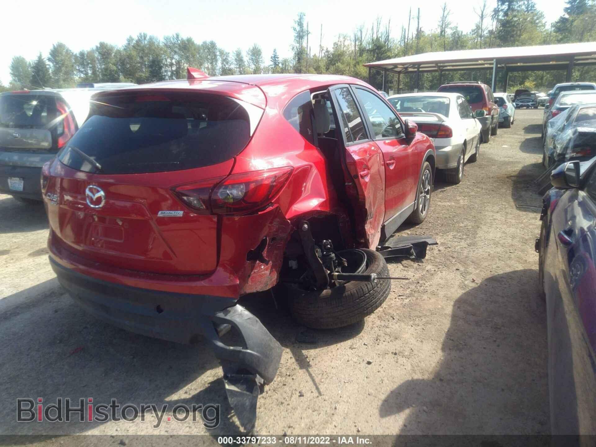 2016 MAZDA CX-5 - VIN: JM3KE4DY2G0880976 - Фото 4