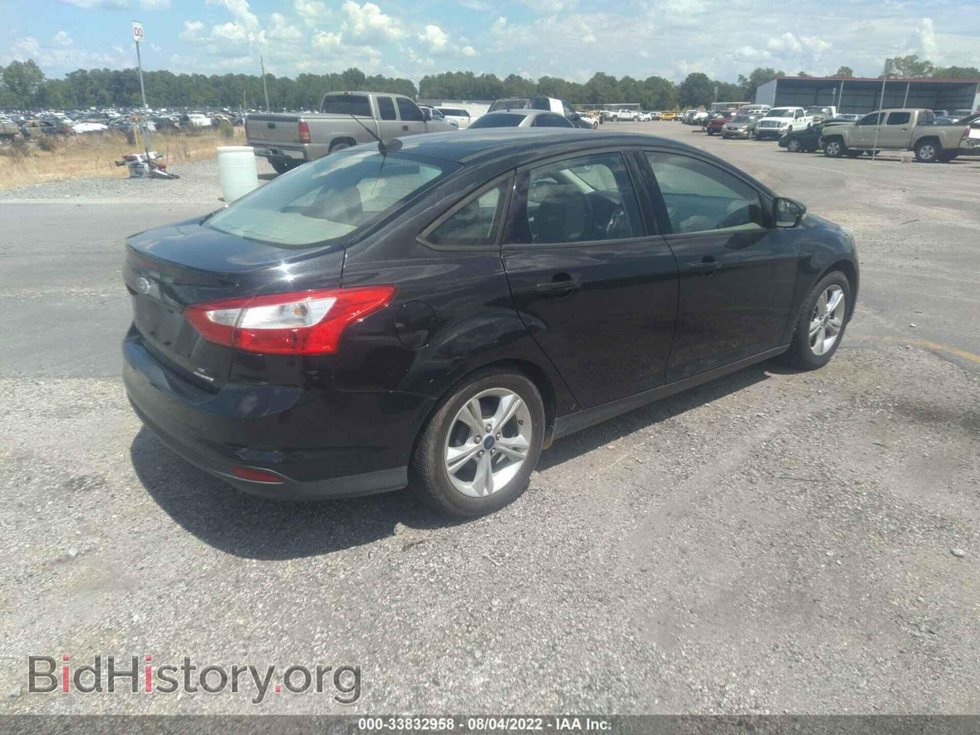 2014 FORD FOCUS - VIN: 1FADP3F28EL304521 - Photo 4