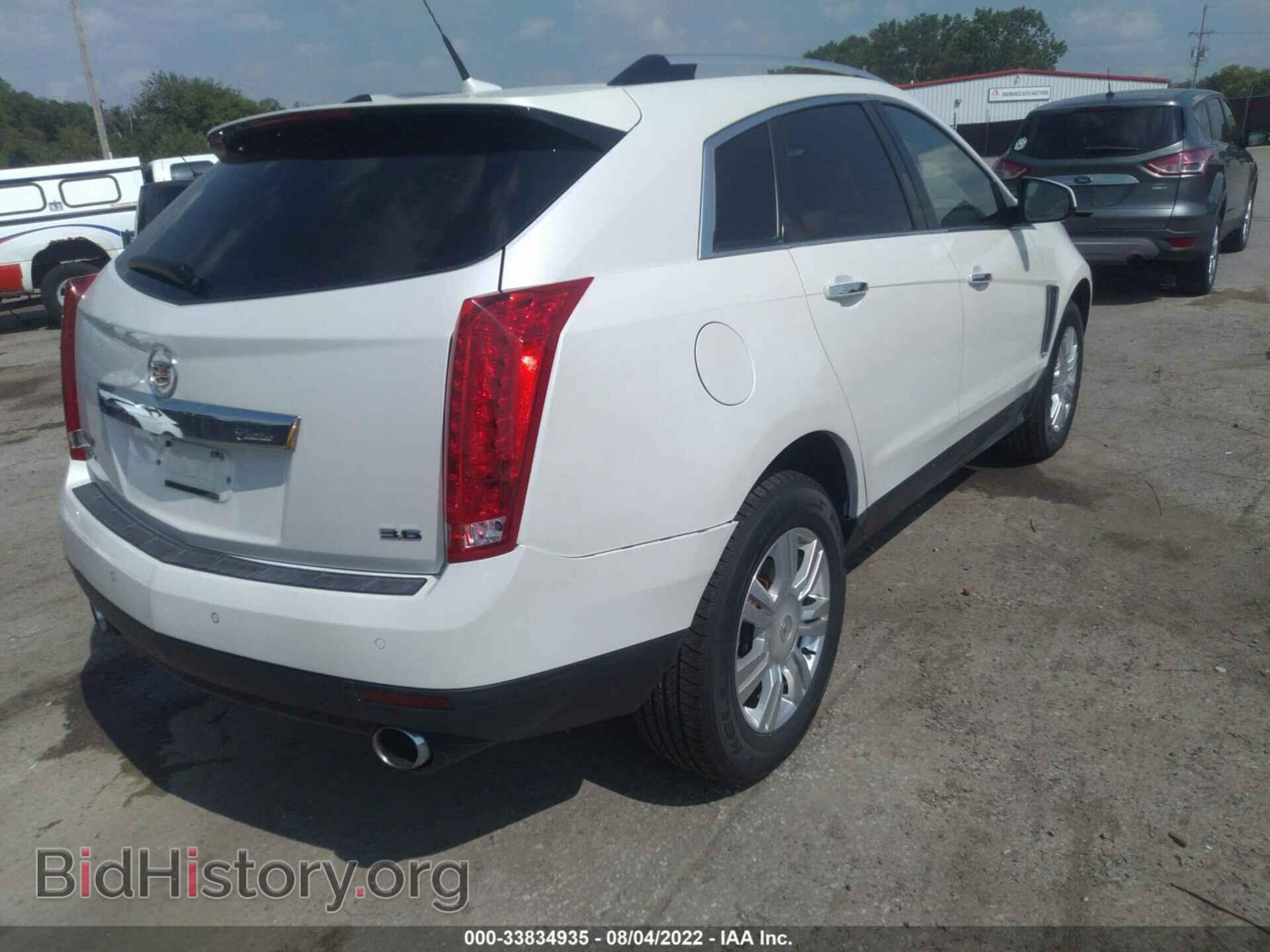 2014 CADILLAC SRX - VIN: 3GYFNBE31ES516632 - Фото 6