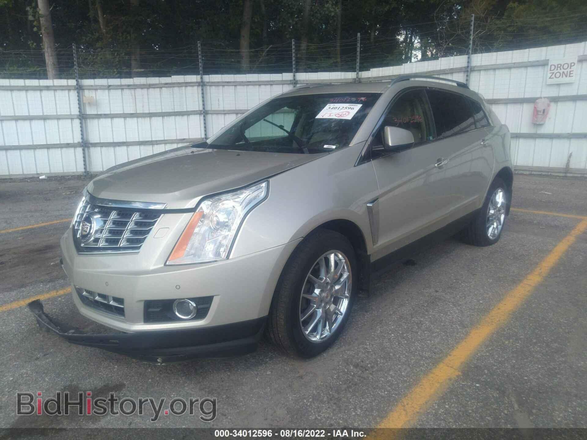 2013 CADILLAC SRX - VIN: 3GYFNEE32DS560848 - Фото 2