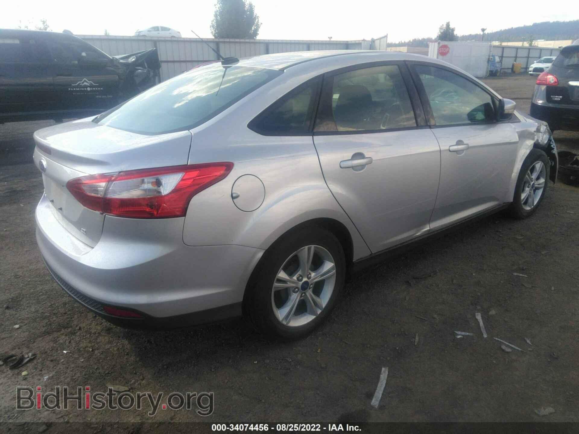 2014 FORD FOCUS - VIN: 1FADP3F21EL441901 - Photo 4