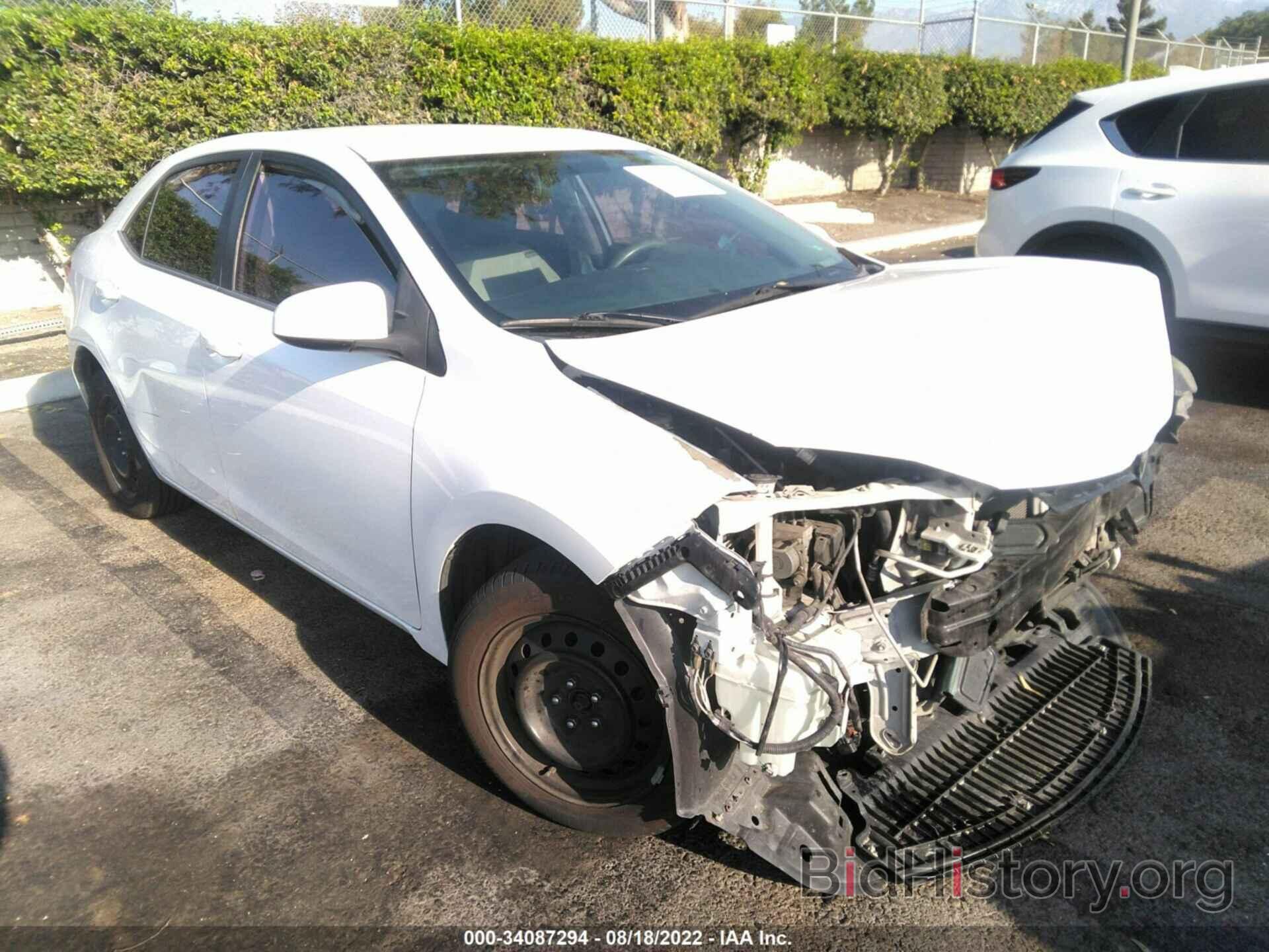 Photo 5YFBURHE0EP099823 - TOYOTA COROLLA 2014