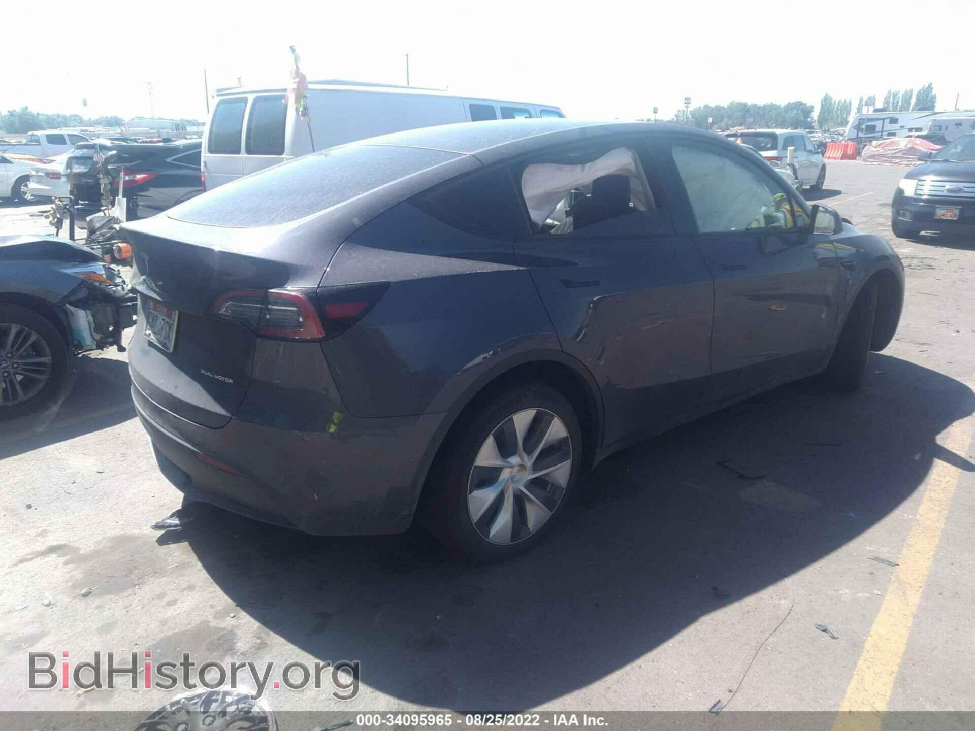 2022 TESLA MODEL Y - VIN: 7SAYGAEE1NF401237 - Фото 4