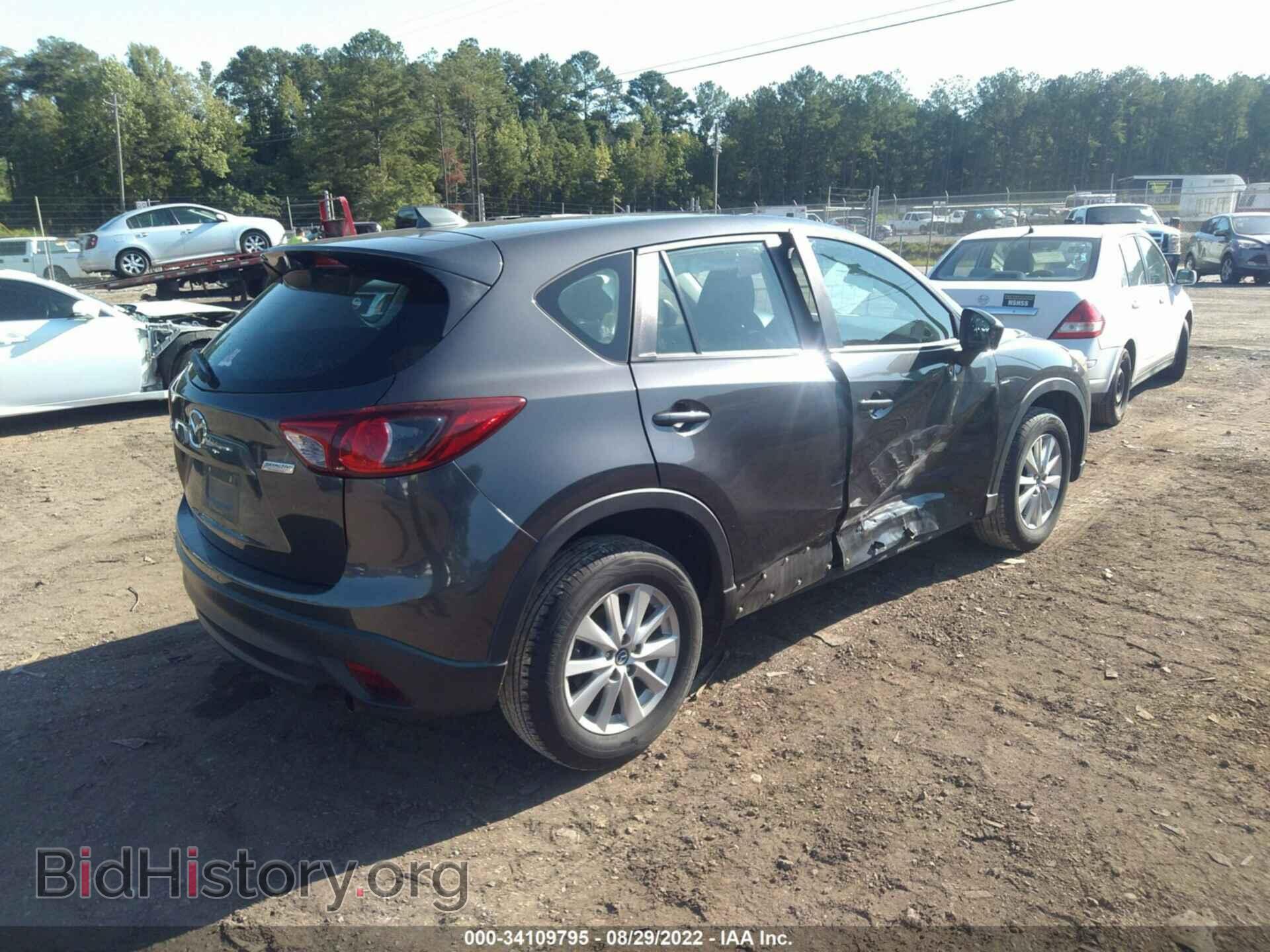 2014 MAZDA CX-5 - VIN: JM3KE2BE4E0352057 - Фото 4