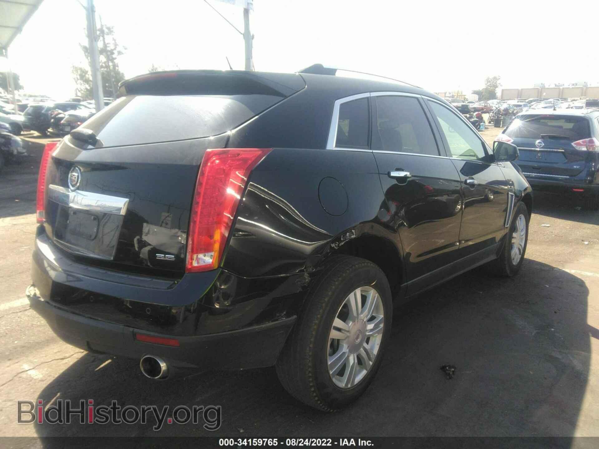 2016 CADILLAC SRX - VIN: 3GYFNBE33GS568475 - Фото 4