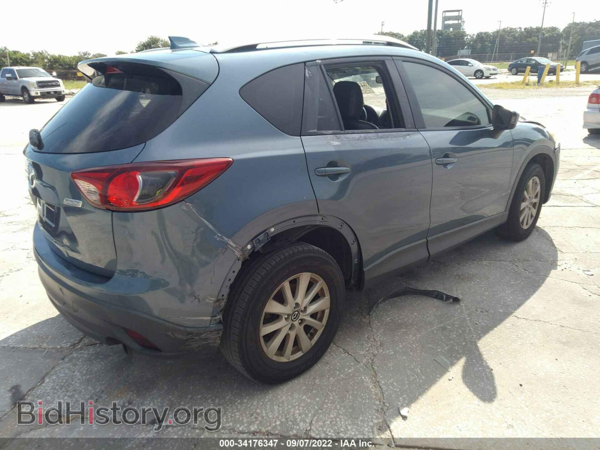 2014 MAZDA CX-5 - VIN: JM3KE2CY9E0413623 - Фото 4