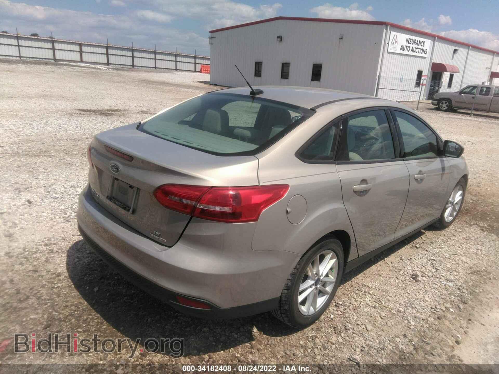 2016 FORD FOCUS - VIN: 1FADP3F24GL378909 - Photo 4