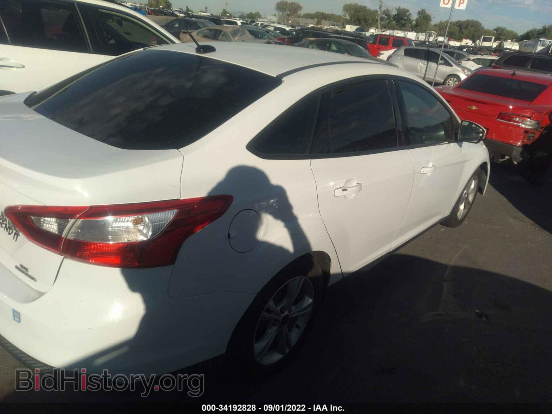 2014 FORD FOCUS - VIN: 1FADP3F21EL400927 - Photo 4