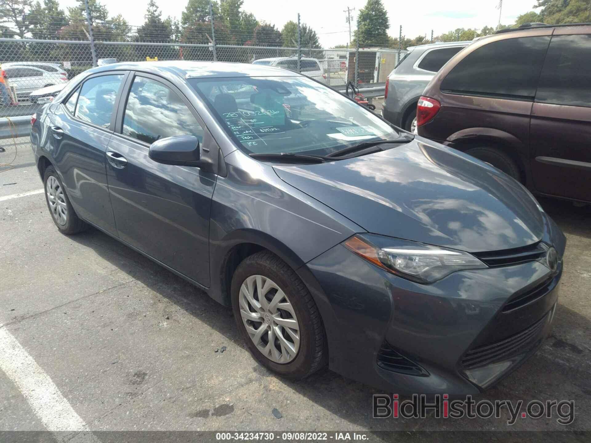 Photo 5YFBURHE0JP779473 - TOYOTA COROLLA 2018