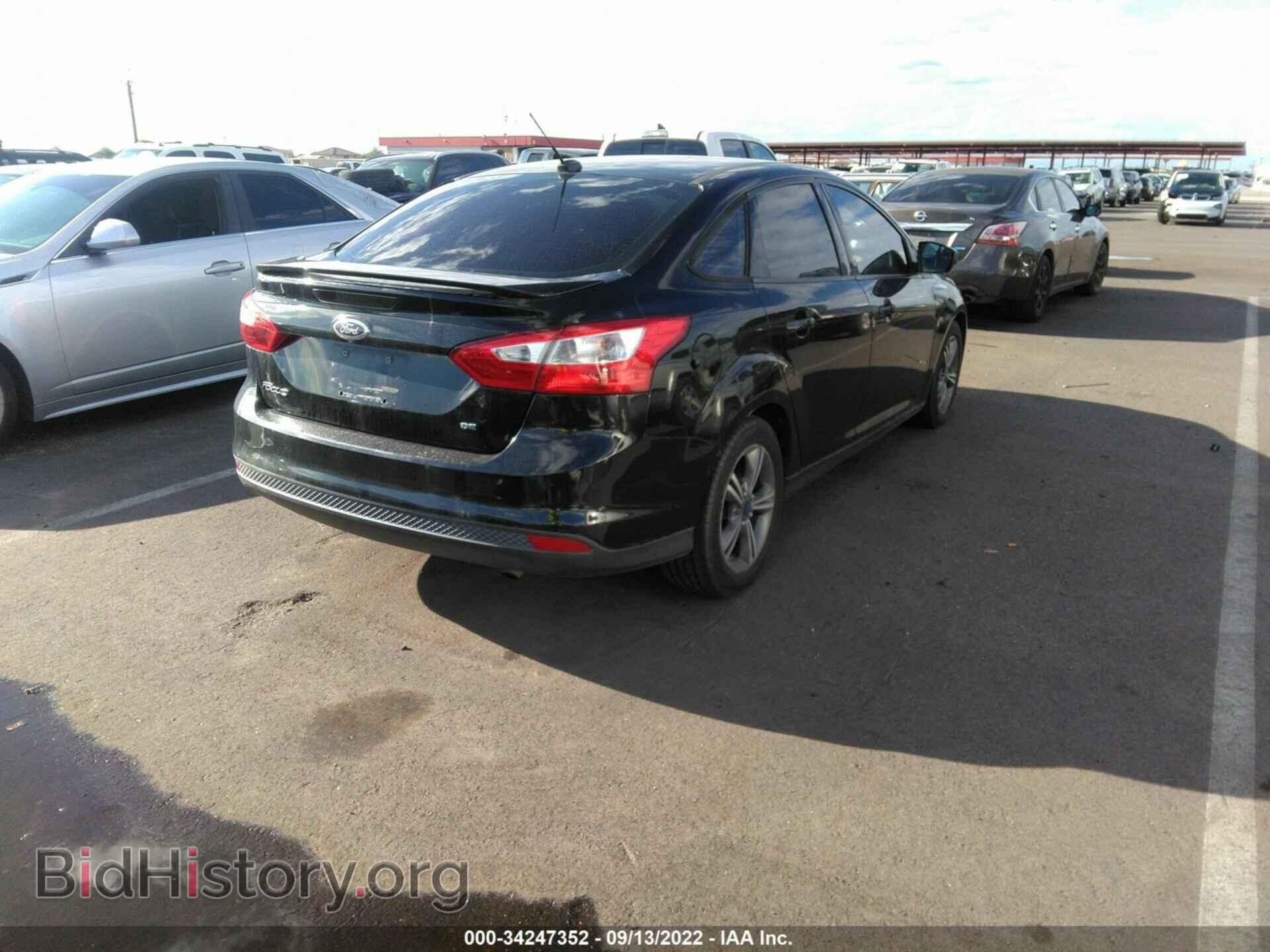 2014 FORD FOCUS - VIN: 1FADP3F23EL317032 - Photo 4