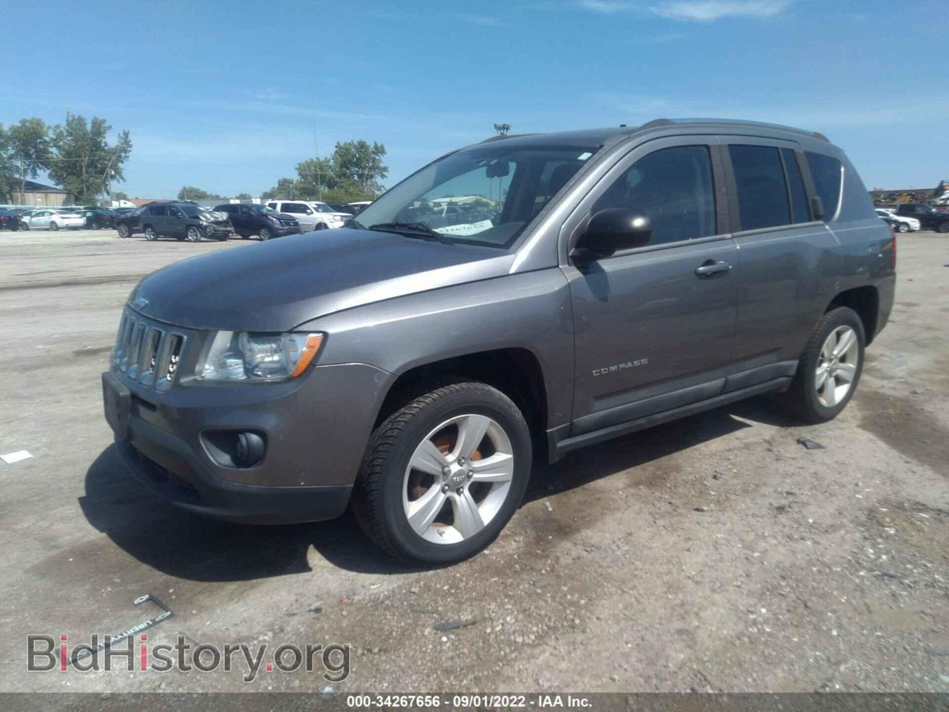 2011 JEEP COMPASS - VIN: 1J4NT1FA8BD182443 - Photo 2