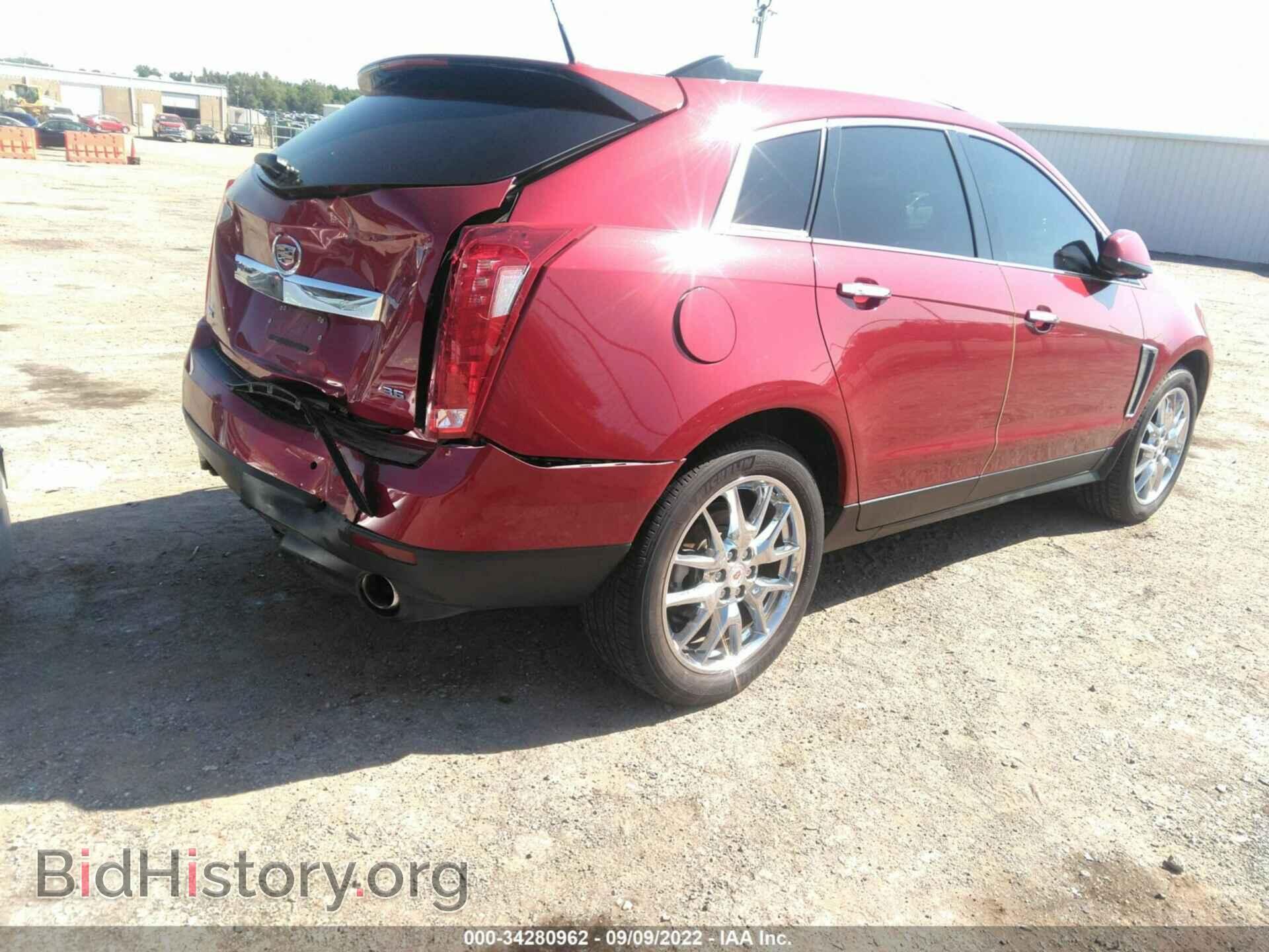 2014 CADILLAC SRX - VIN: 3GYFNCE30ES584278 - Фото 4