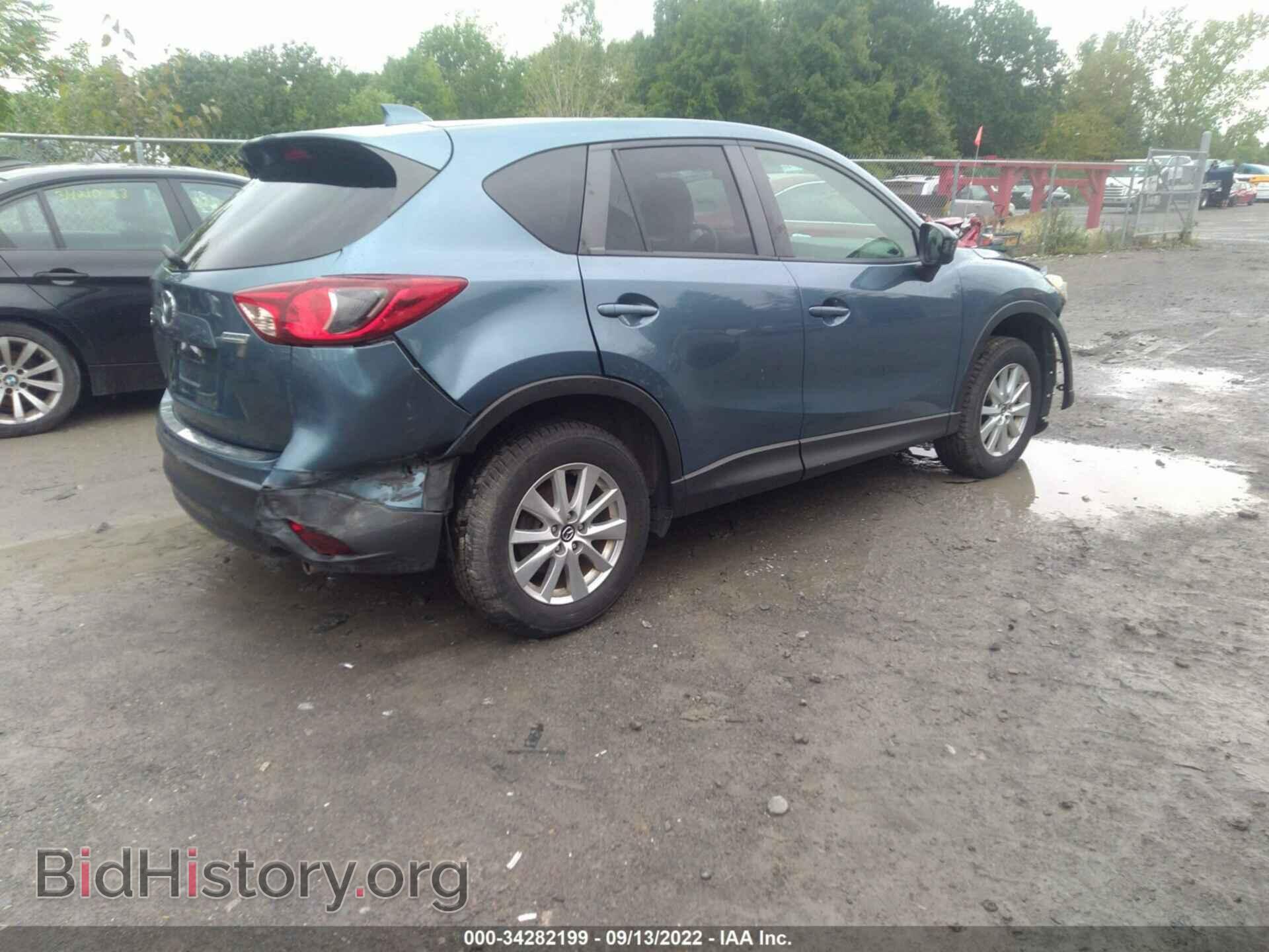 2014 MAZDA CX-5 - VIN: JM3KE4CY6E0398347 - Фото 4