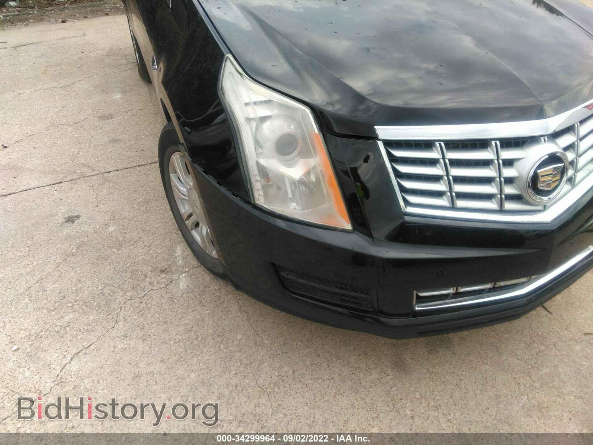 2014 CADILLAC SRX - VIN: 3GYFNBE32ES598550 - Фото 6