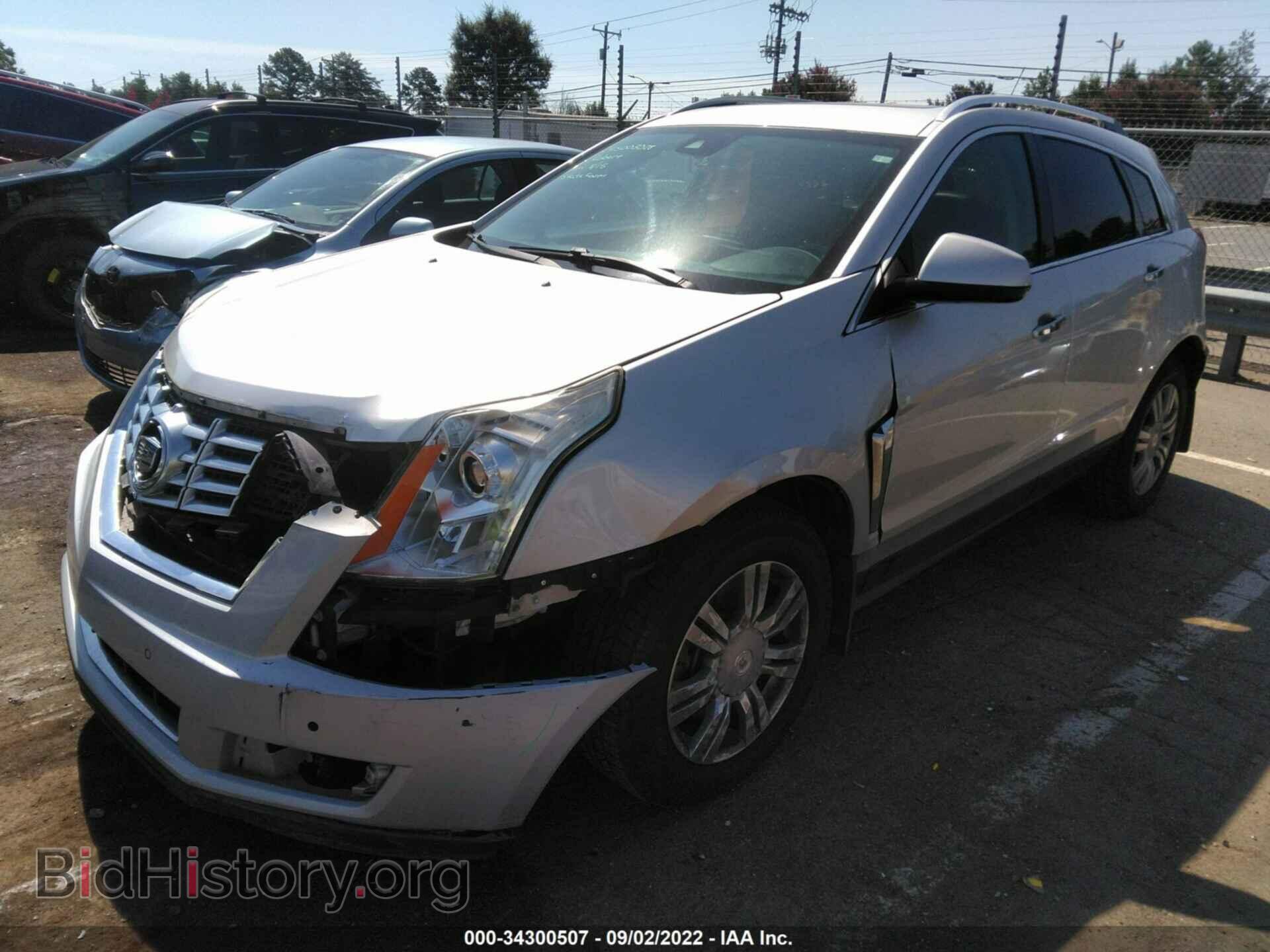 2013 CADILLAC SRX - VIN: 3GYFNCE38DS552256 - Фото 2