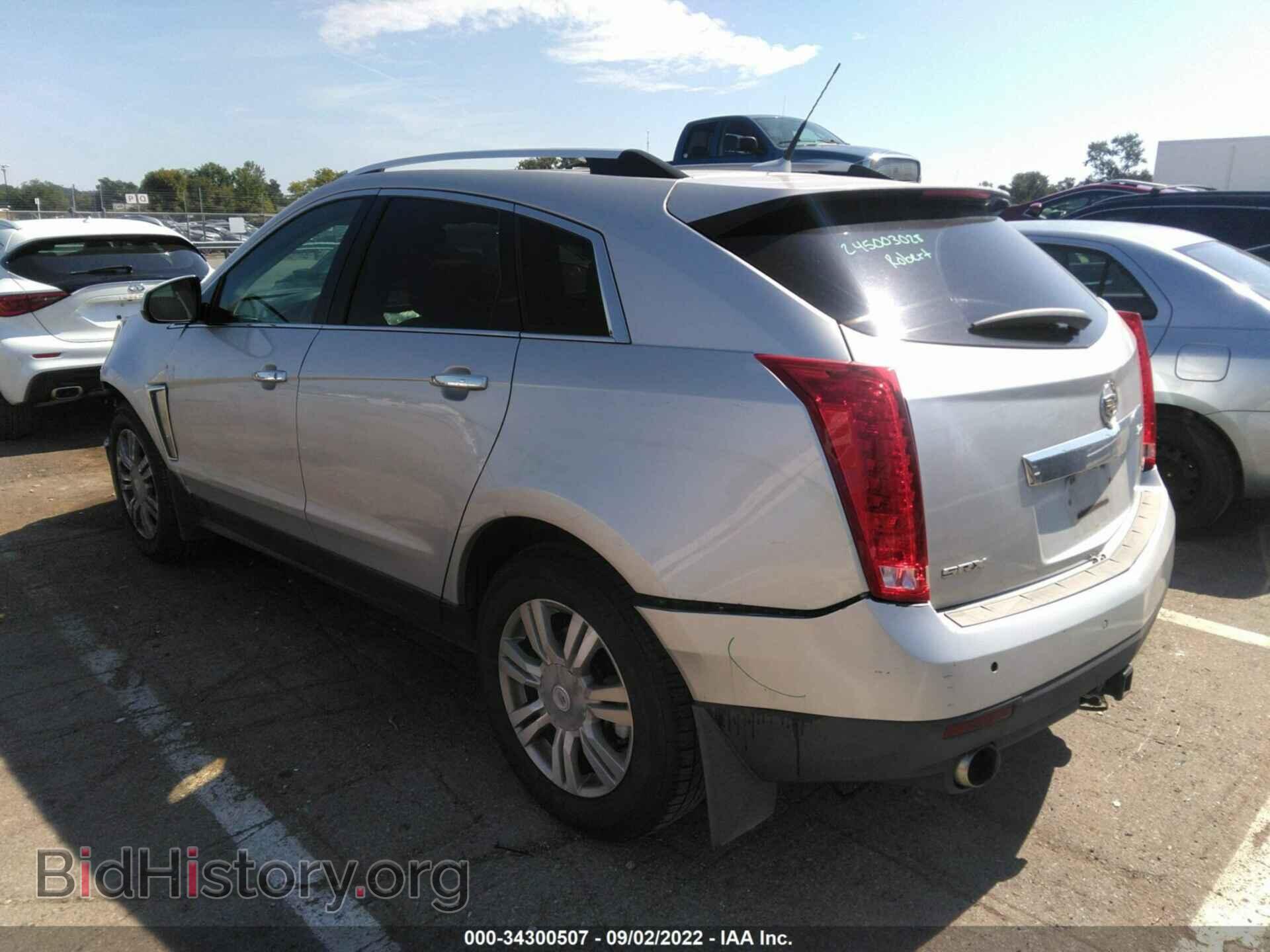 2013 CADILLAC SRX - VIN: 3GYFNCE38DS552256 - Фото 3