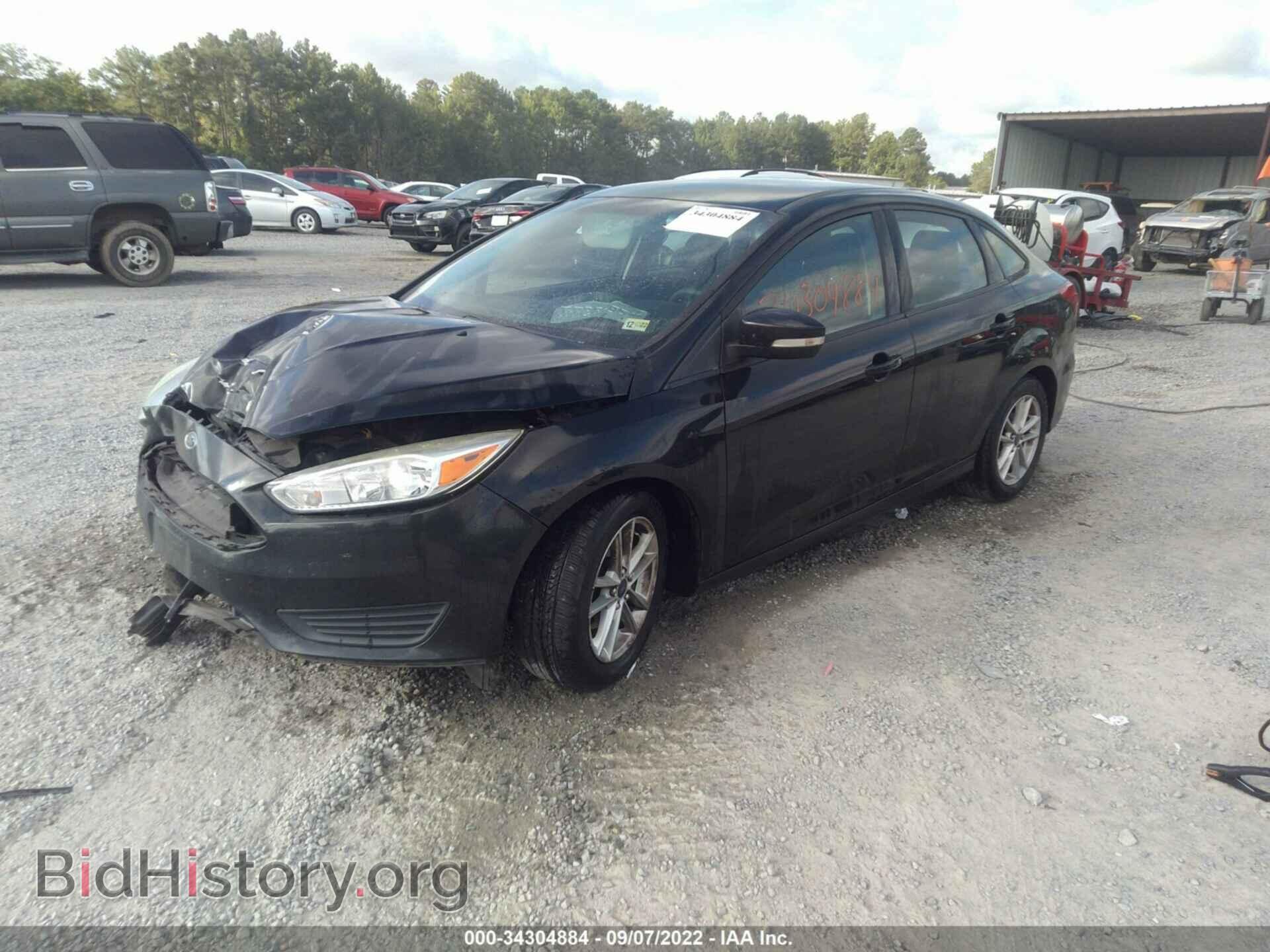2016 FORD FOCUS - VIN: 1FADP3F29GL272276 - Фото 2