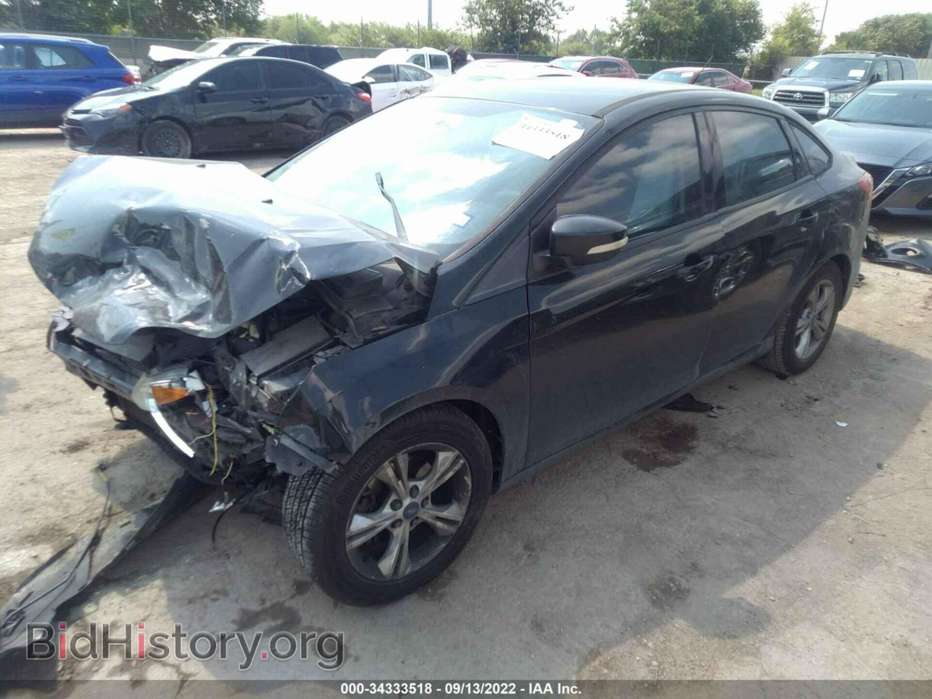 2014 FORD FOCUS - VIN: 1FADP3F21EL109022 - Photo 2