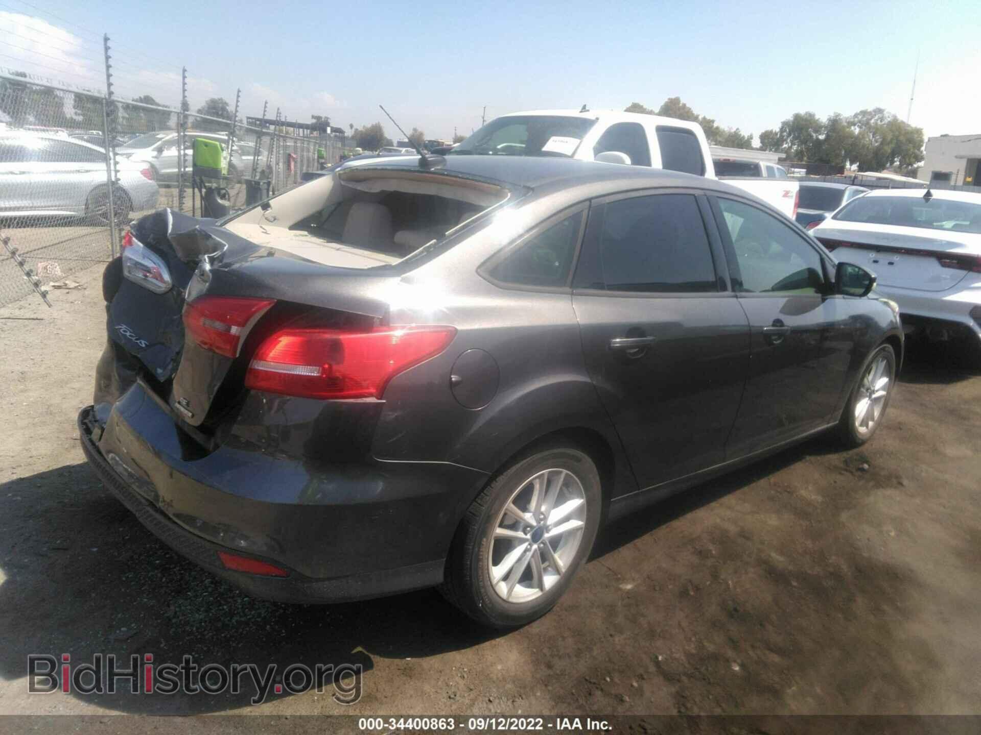 2015 FORD FOCUS - VIN: 1FADP3F22FL230921 - Photo 4