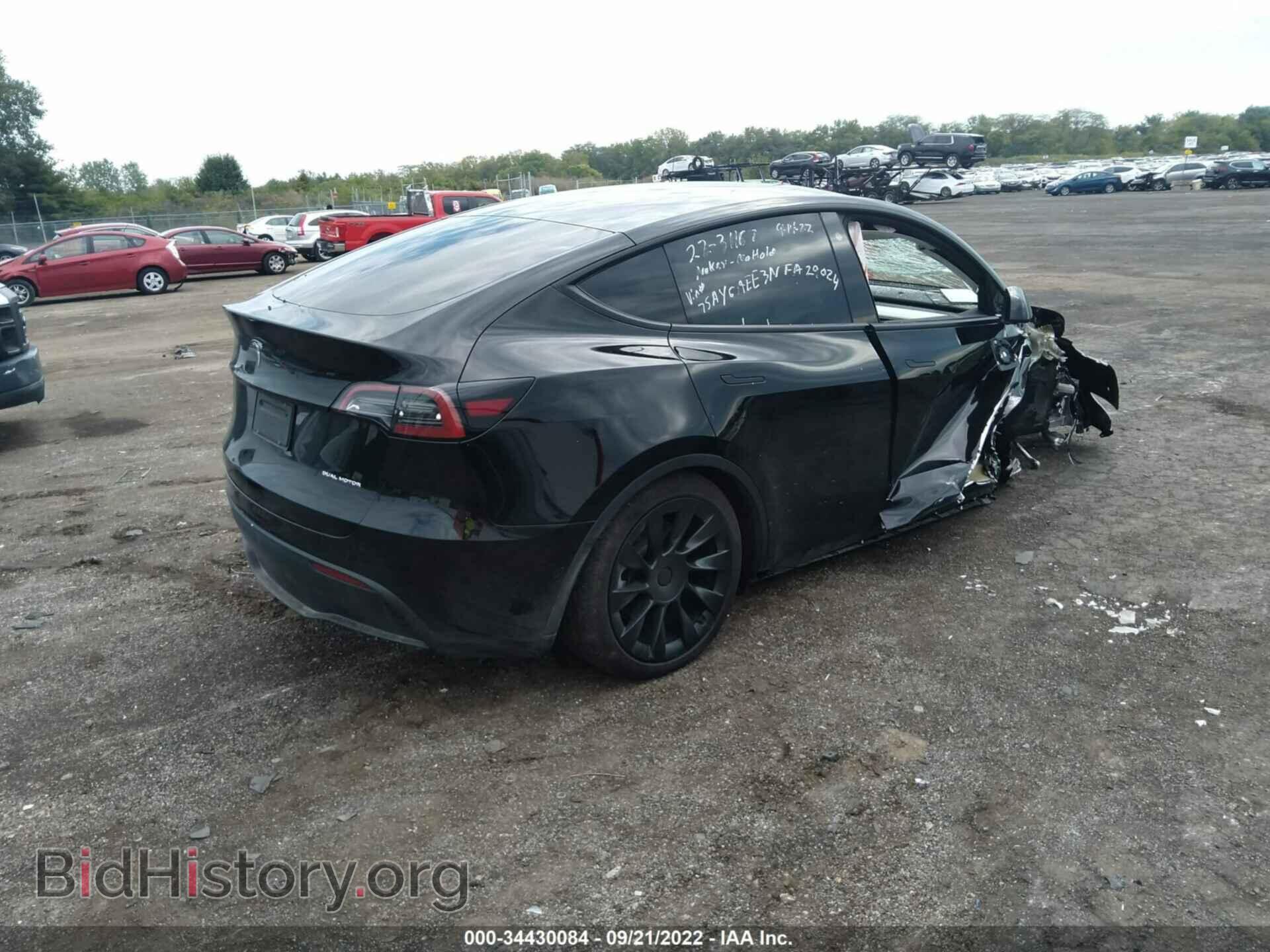 2022 TESLA MODEL Y - VIN: 7SAYGAEE3NF429024 - Photo 4