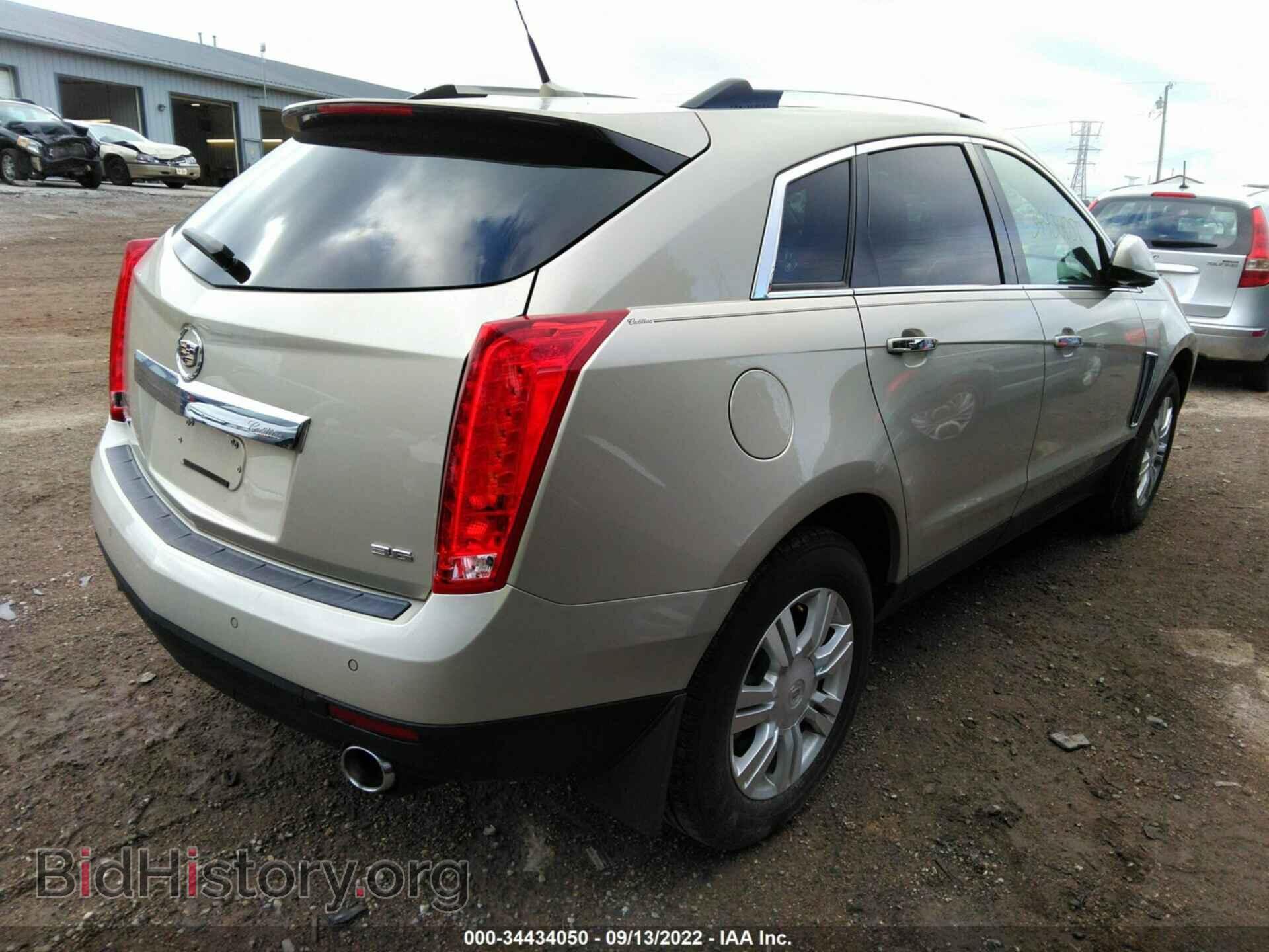 2013 CADILLAC SRX - VIN: 3GYFNCE3XDS628754 - Фото 4