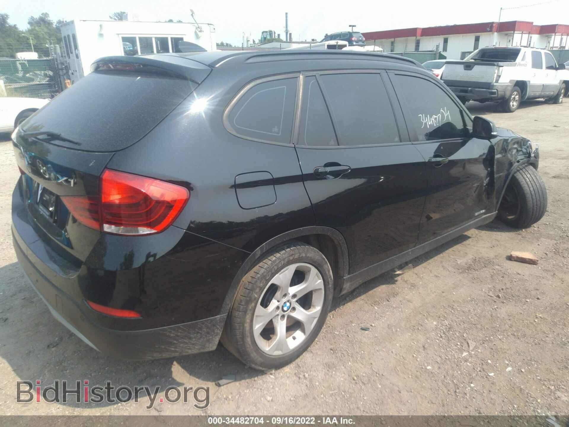2014 BMW X1 - VIN: WBAVM1C52EVW50995 - Фото 4